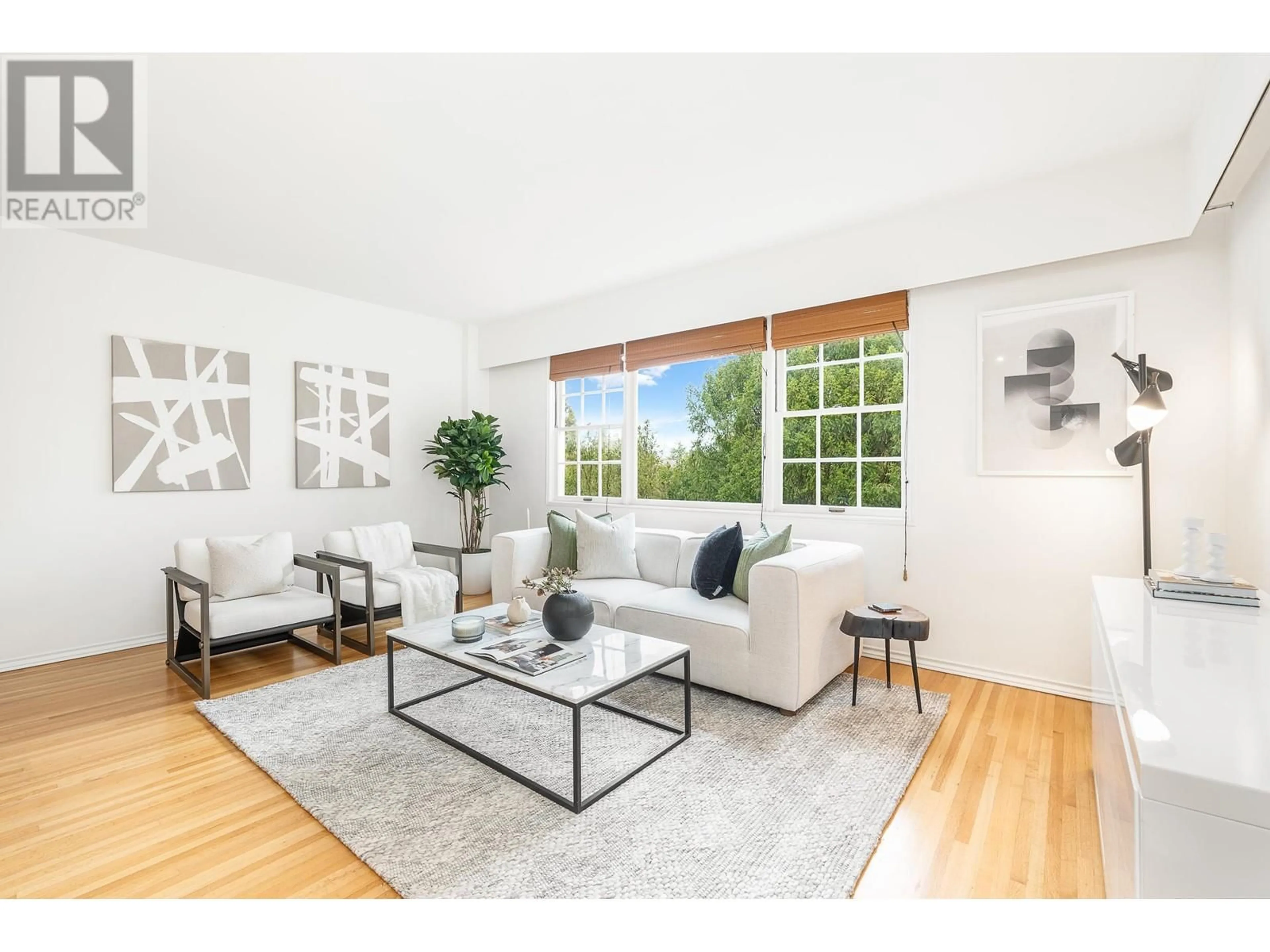 Living room with furniture, wood/laminate floor for 320 - 2890 POINT GREY ROAD, Vancouver British Columbia V6K1A9