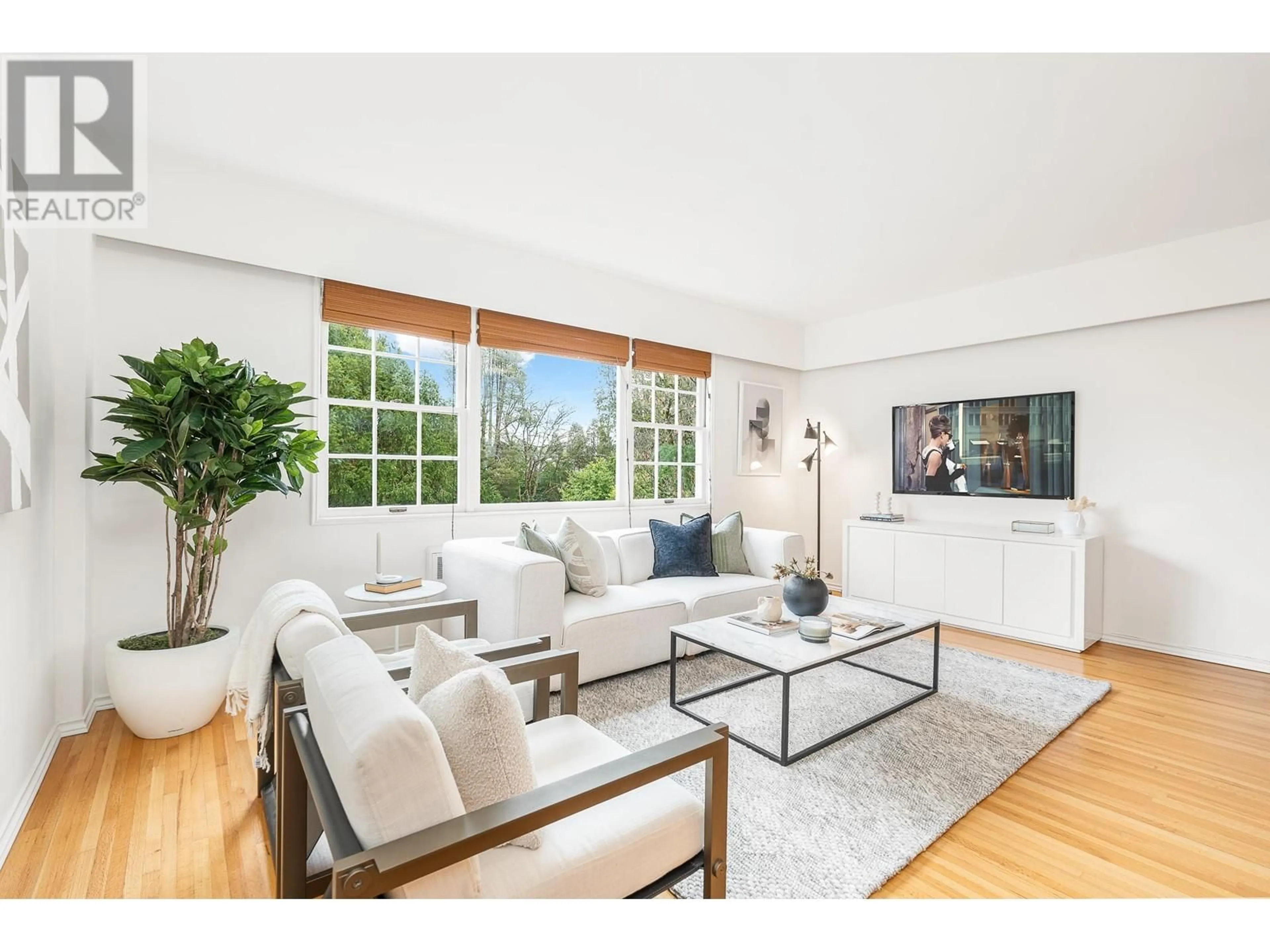 Living room with furniture, wood/laminate floor for 320 - 2890 POINT GREY ROAD, Vancouver British Columbia V6K1A9
