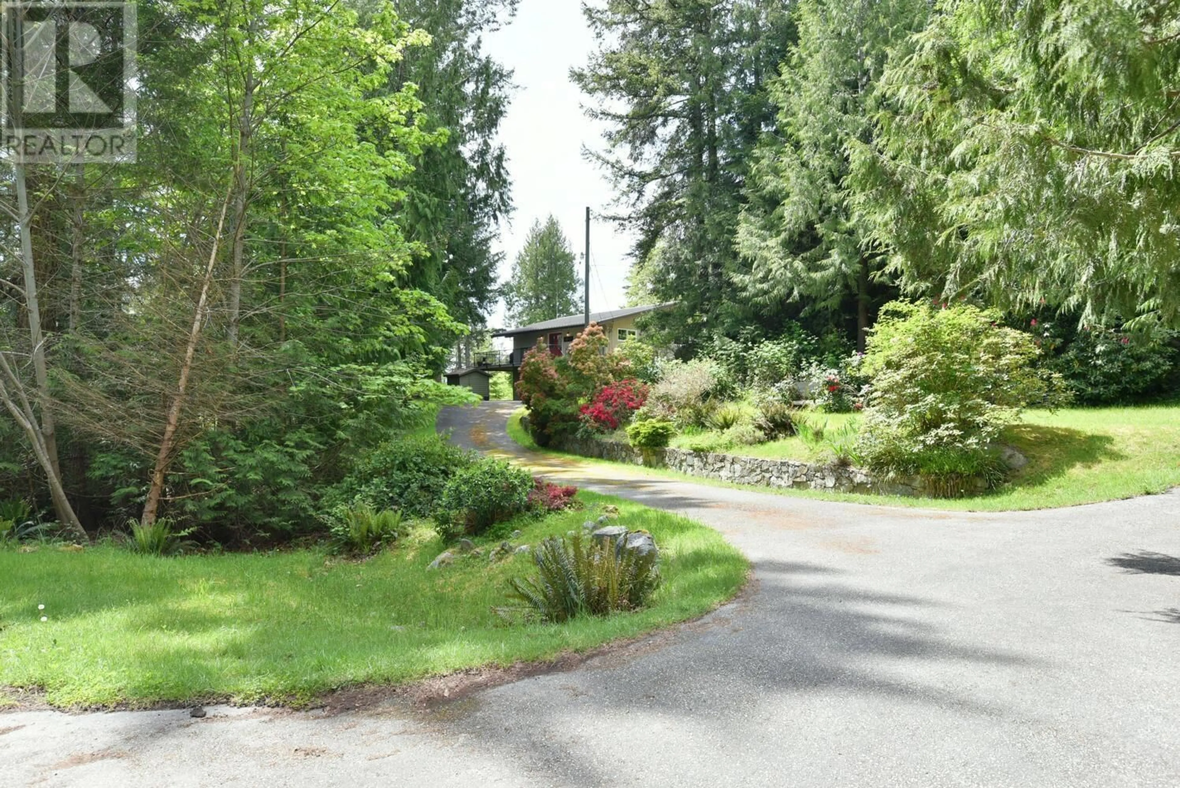 A pic from outside/outdoor area/front of a property/back of a property/a pic from drone, street for 13257 DELLER ROAD, Garden Bay British Columbia V0N1S1