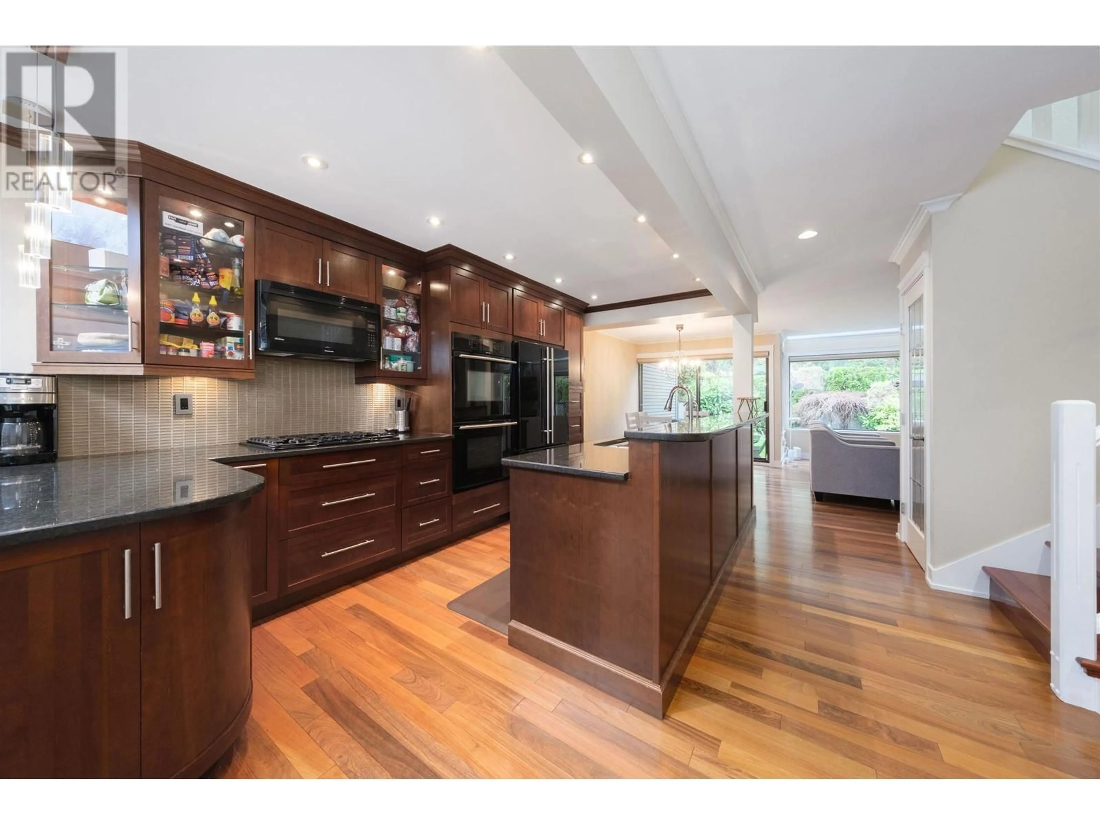 Open concept kitchen, wood/laminate floor for 1151 MONTROYAL BOULEVARD, North Vancouver British Columbia V7R2H8