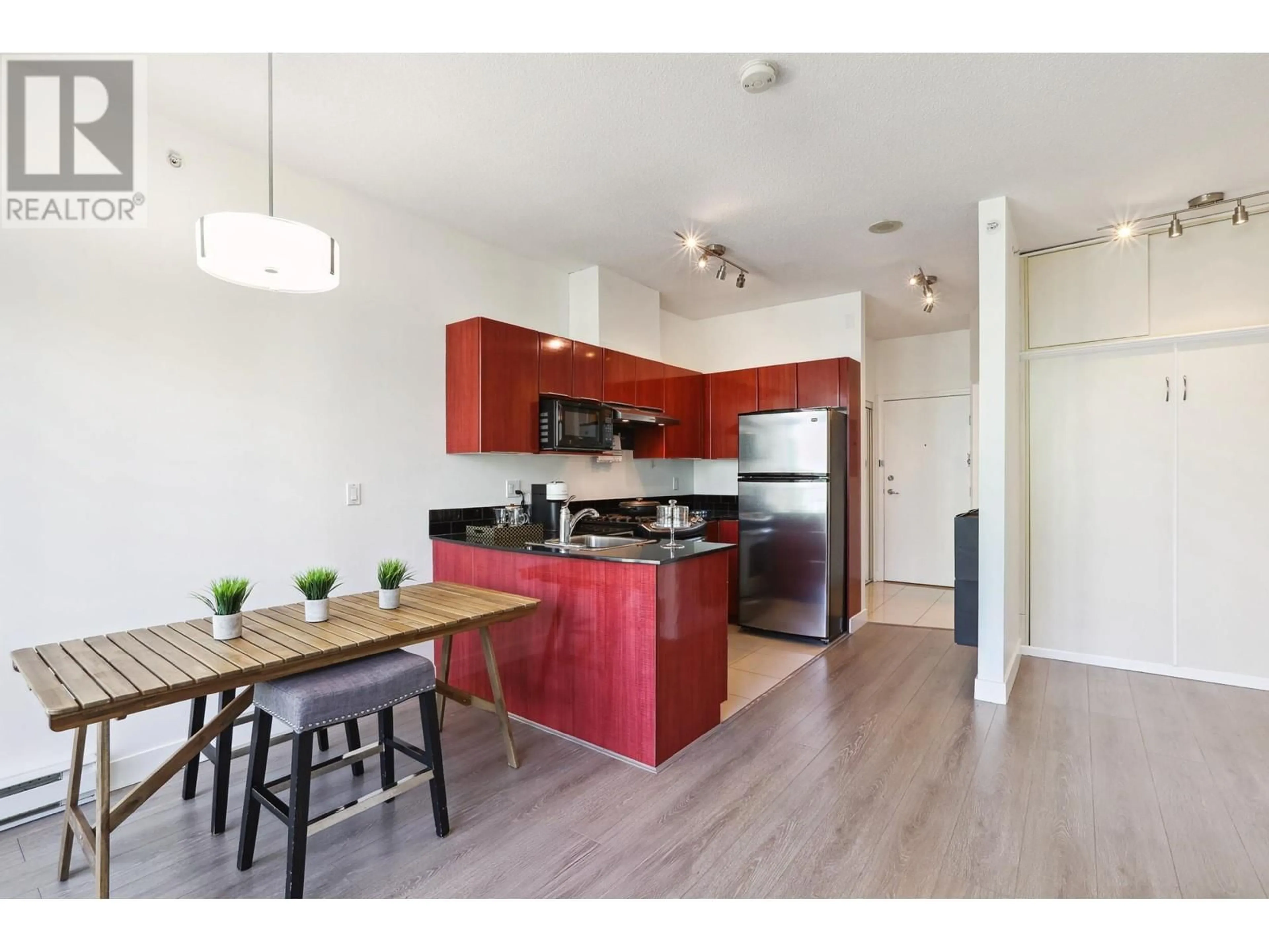 Open concept kitchen, wood/laminate floor for 1606 - 1239 GEORGIA STREET, Vancouver British Columbia V6E4R8