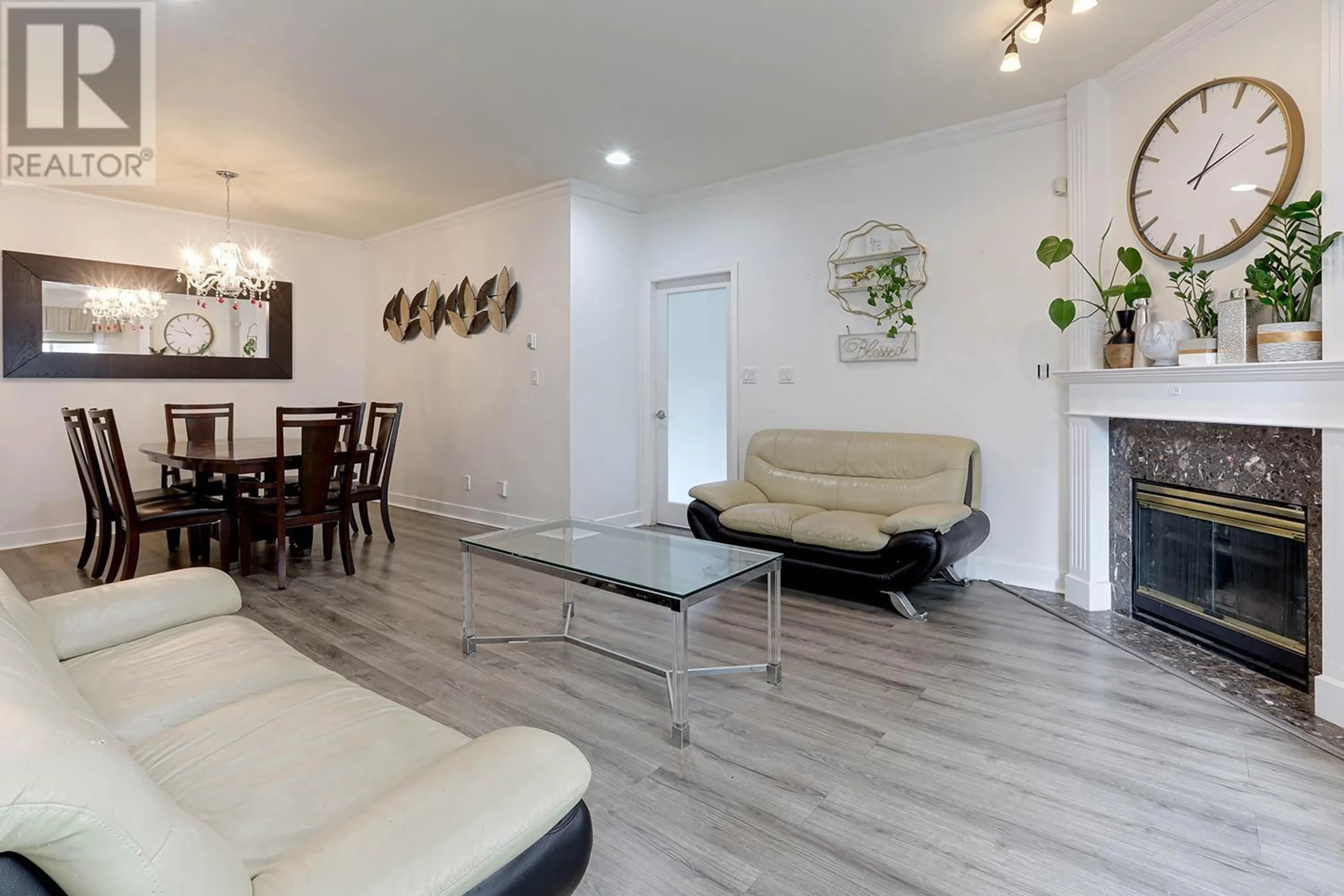 Living room with furniture, wood/laminate floor for 27 - 11888 MELLIS DRIVE, Richmond British Columbia V6X1M1
