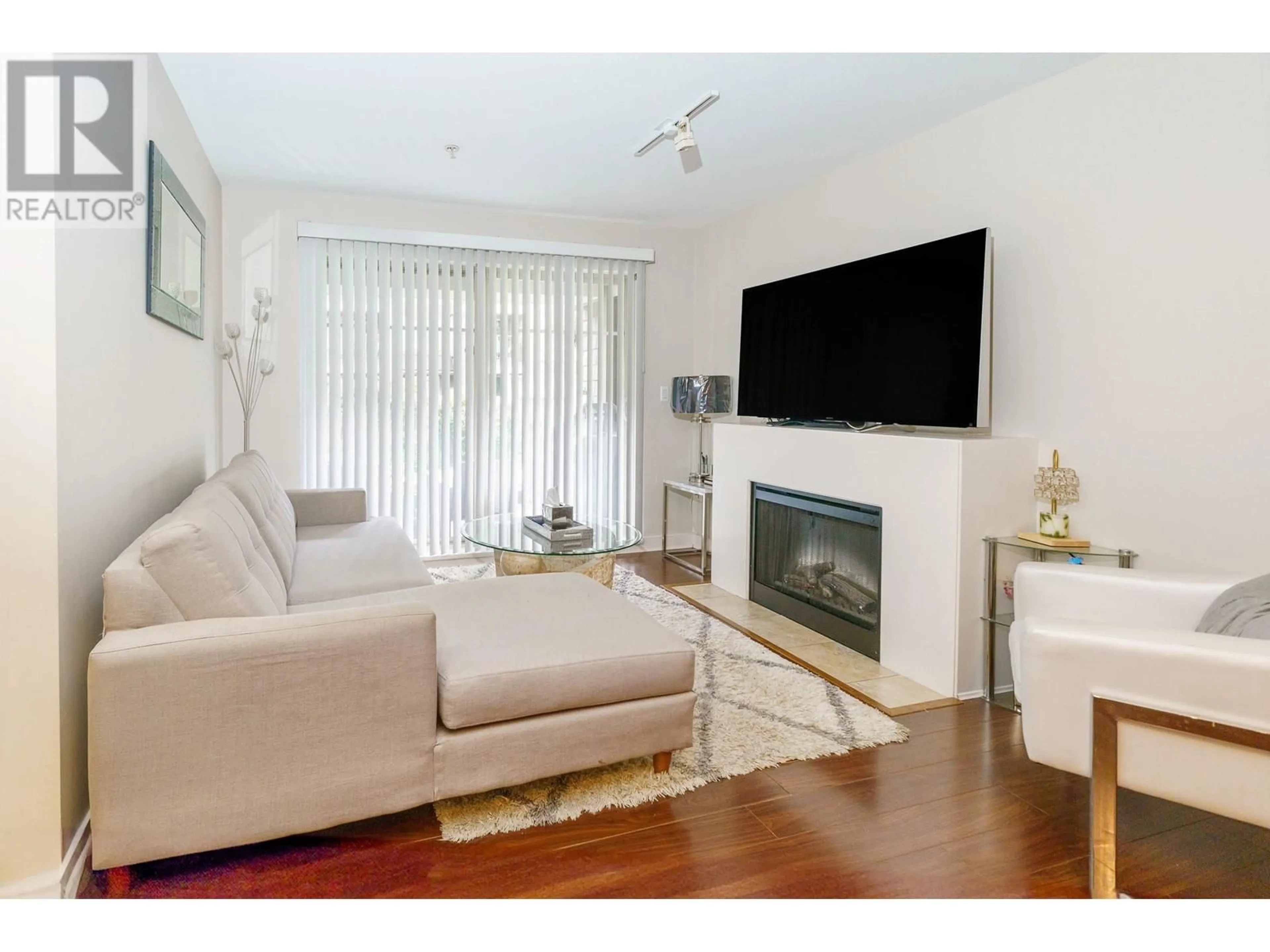 Living room with furniture, wood/laminate floor for 120 - 12238 224 STREET, Maple Ridge British Columbia V2X8W5