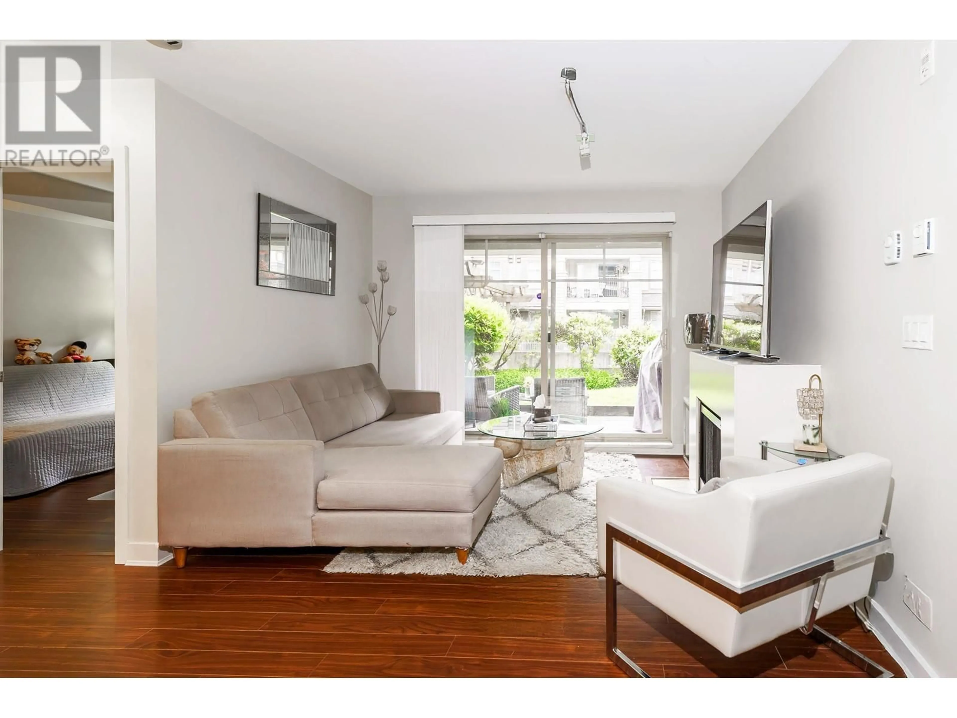 Living room with furniture, wood/laminate floor for 120 - 12238 224 STREET, Maple Ridge British Columbia V2X8W5