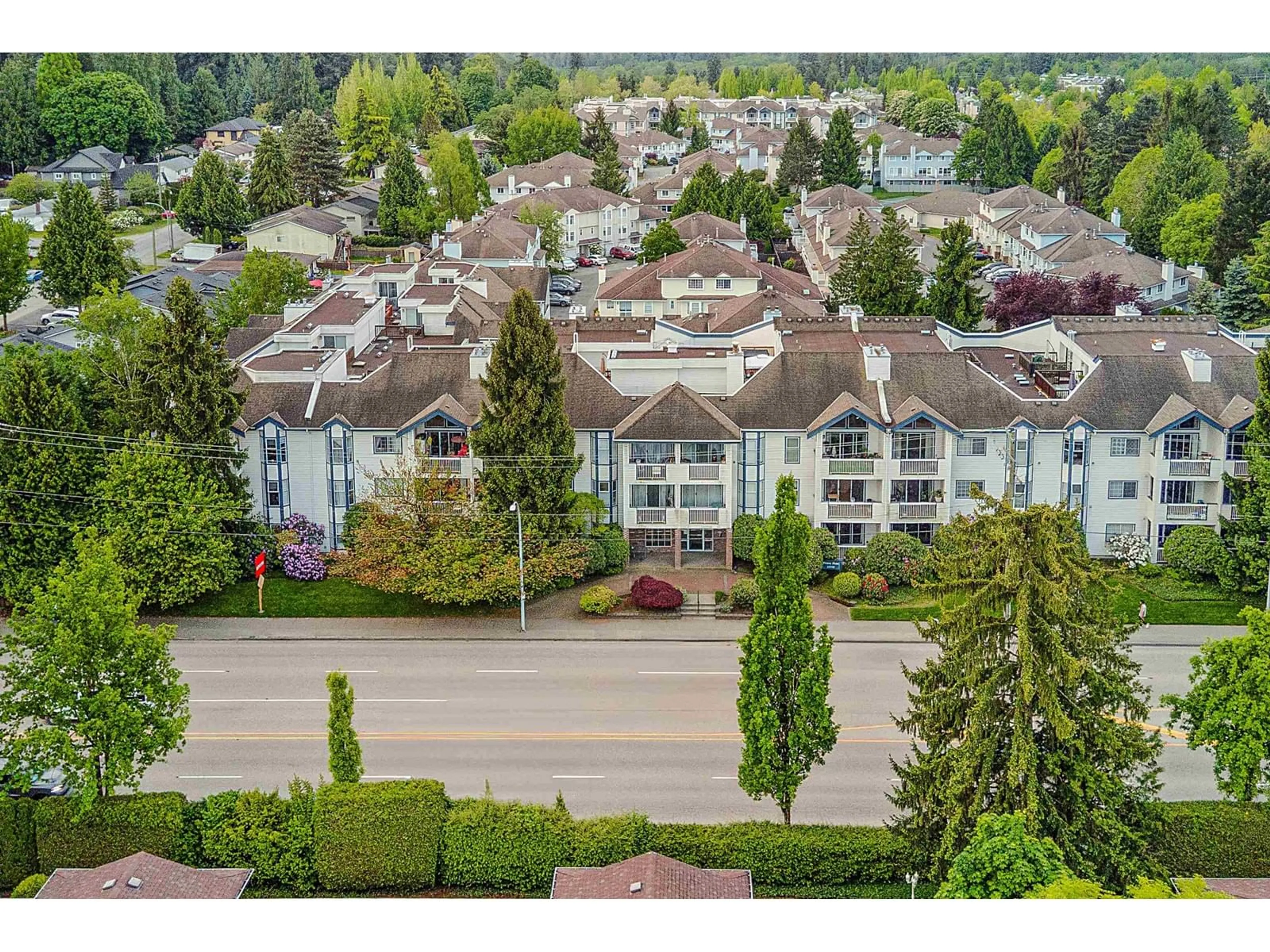 A pic from outside/outdoor area/front of a property/back of a property/a pic from drone, unknown for 101 - 13918 72, Surrey British Columbia V3W0T4