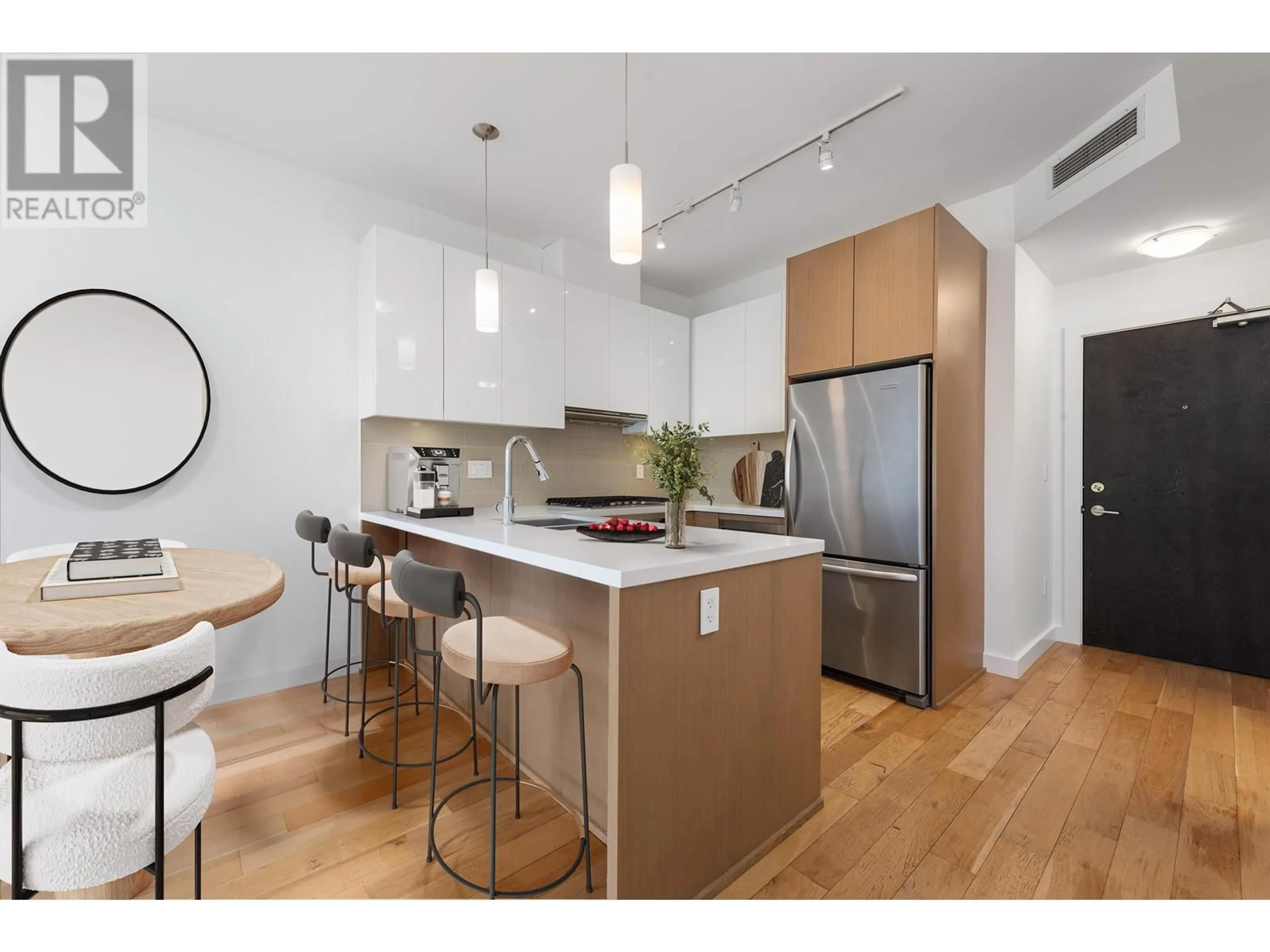 Open concept kitchen, wood/laminate floor for 330 - 5399 CEDARBRIDGE WAY, Richmond British Columbia V6X0L6