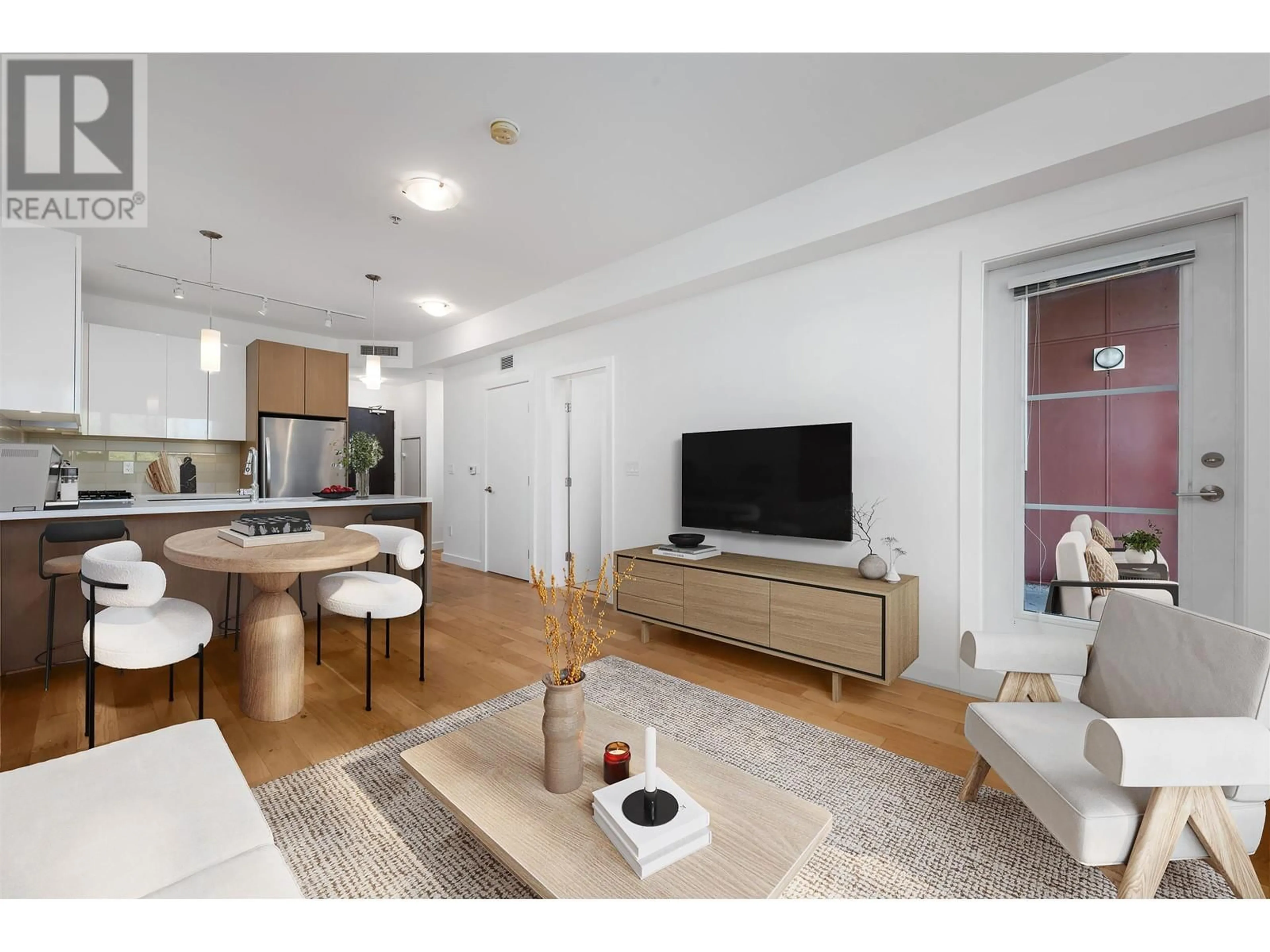 Living room with furniture, wood/laminate floor for 330 - 5399 CEDARBRIDGE WAY, Richmond British Columbia V6X0L6