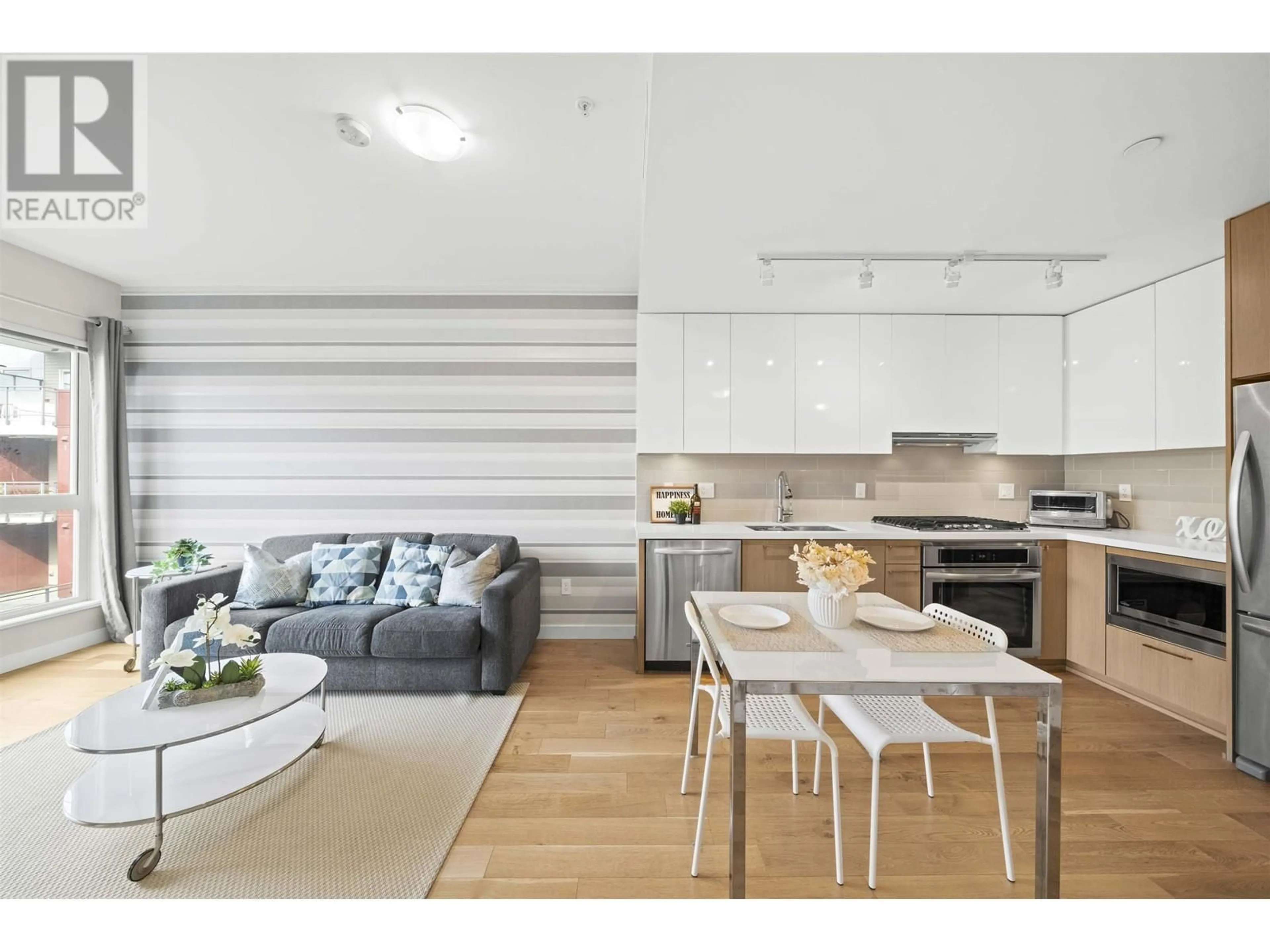 Open concept kitchen, wood/laminate floor for 530 - 5399 CEDARBRIDGE WAY, Richmond British Columbia V6X0L6