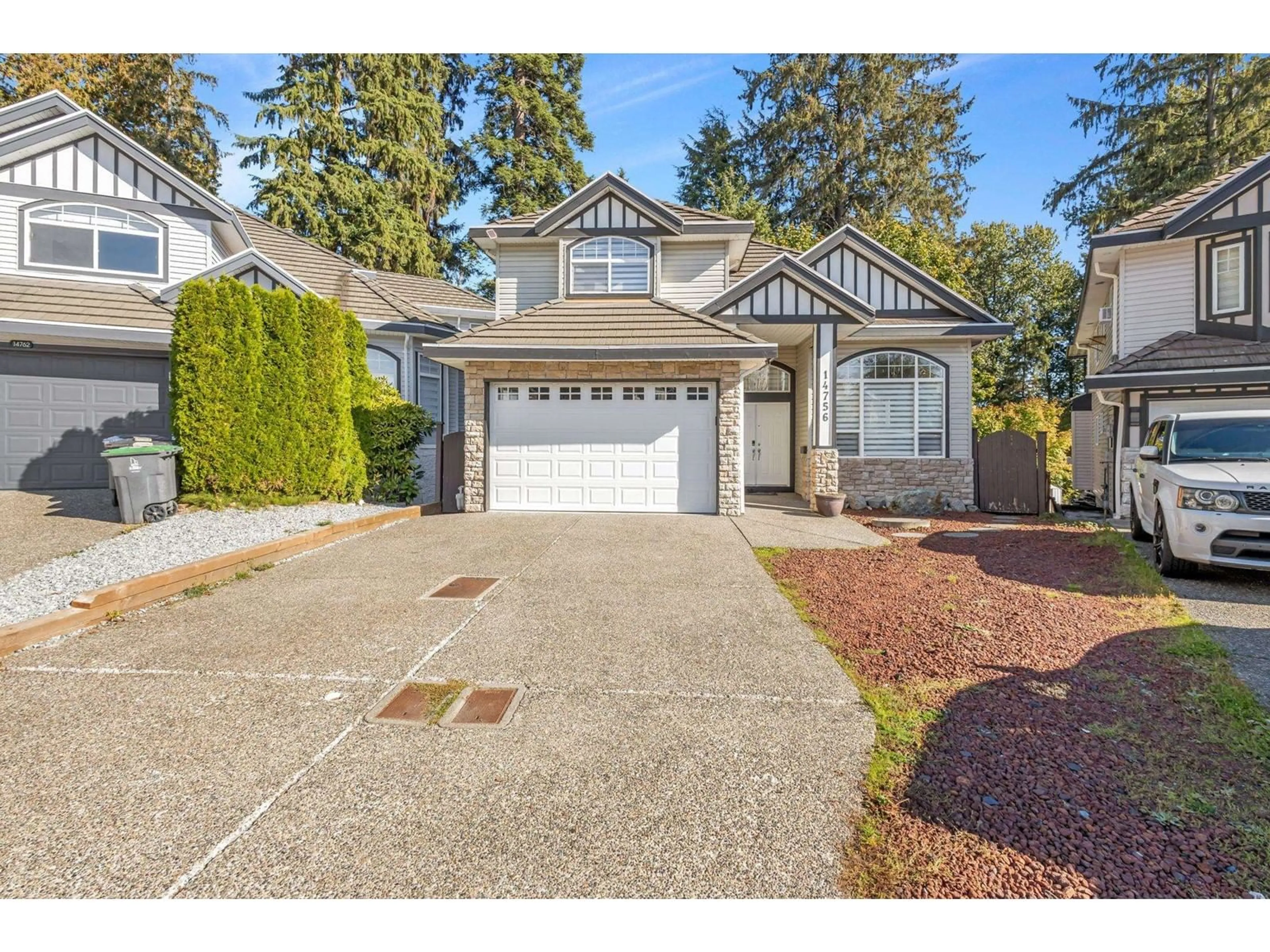 Home with vinyl exterior material, street for 14756 80A, Surrey British Columbia V3S9Y6