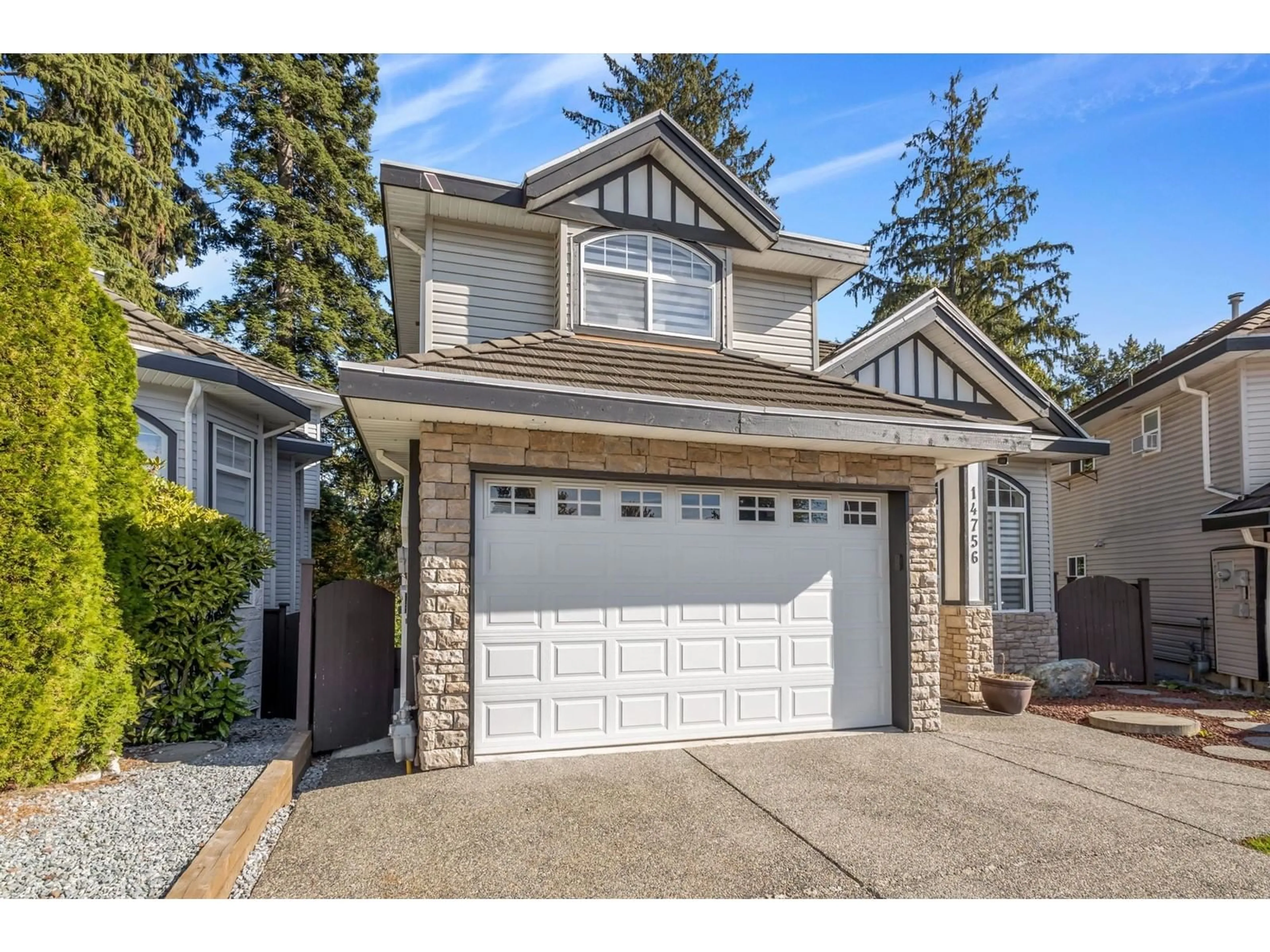 Home with vinyl exterior material, street for 14756 80A, Surrey British Columbia V3S9Y6