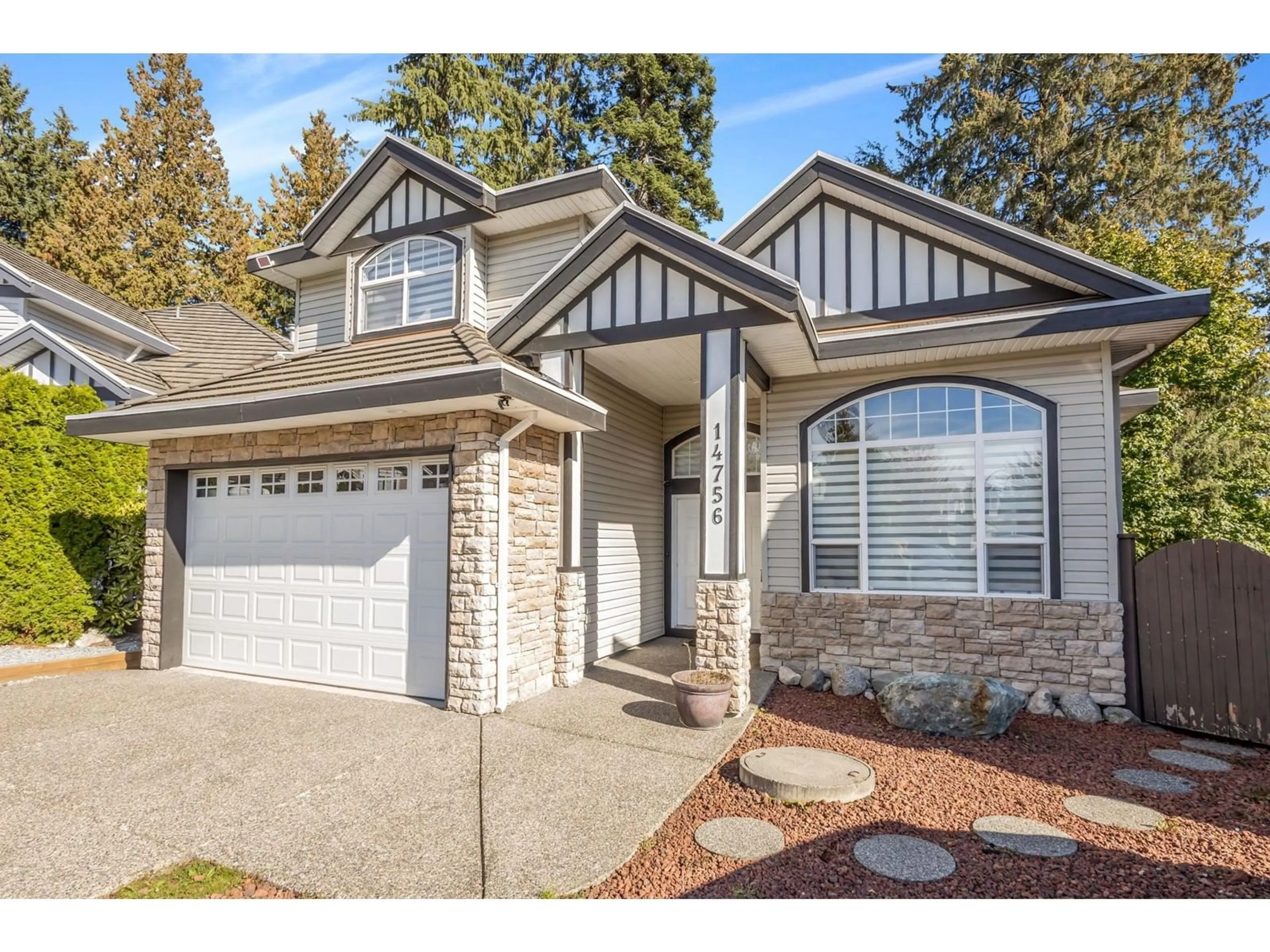 Home with vinyl exterior material, street for 14756 80A, Surrey British Columbia V3S9Y6