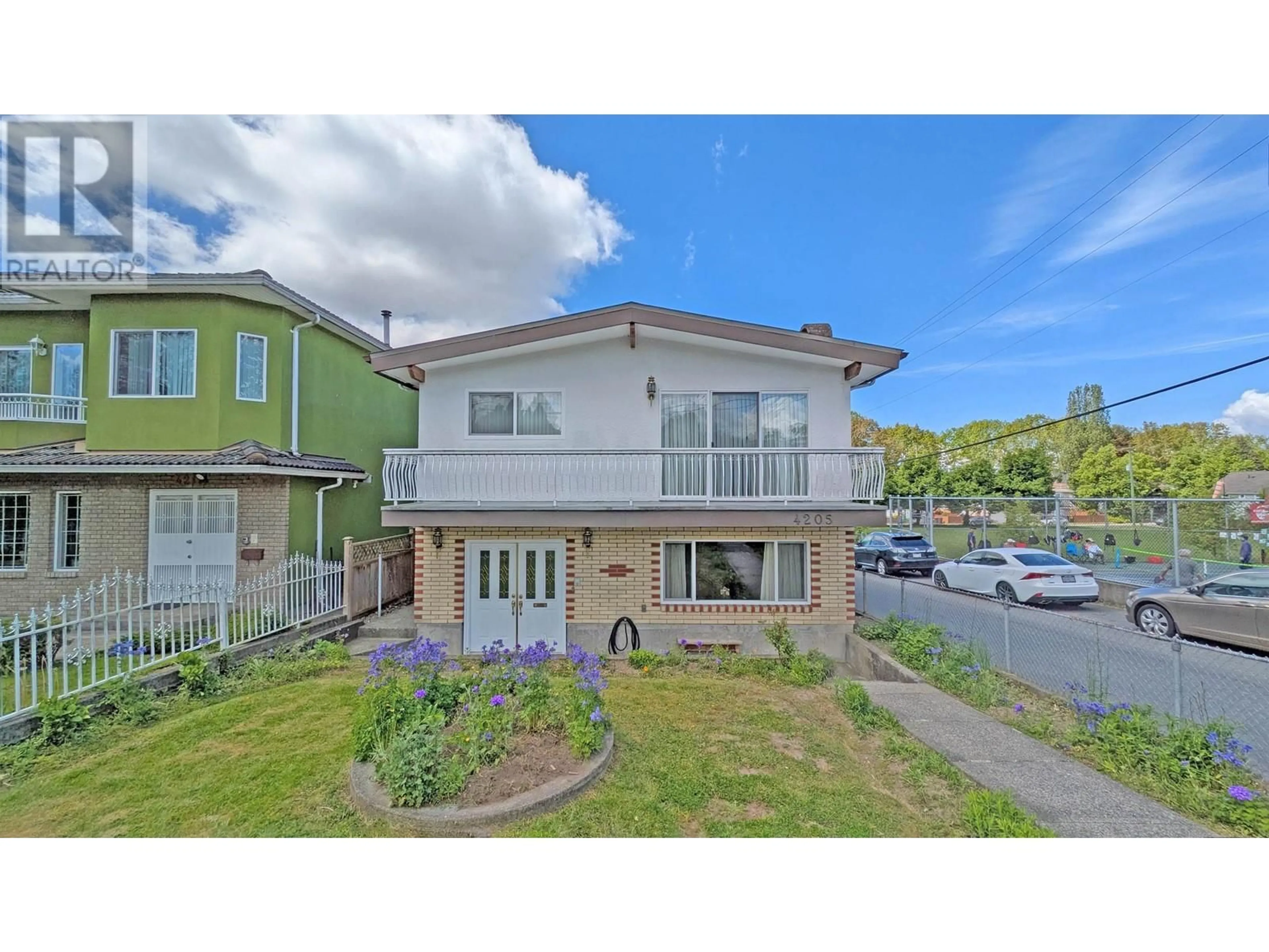 A pic from outside/outdoor area/front of a property/back of a property/a pic from drone, street for 4205 BEATRICE STREET, Vancouver British Columbia V5N4H9