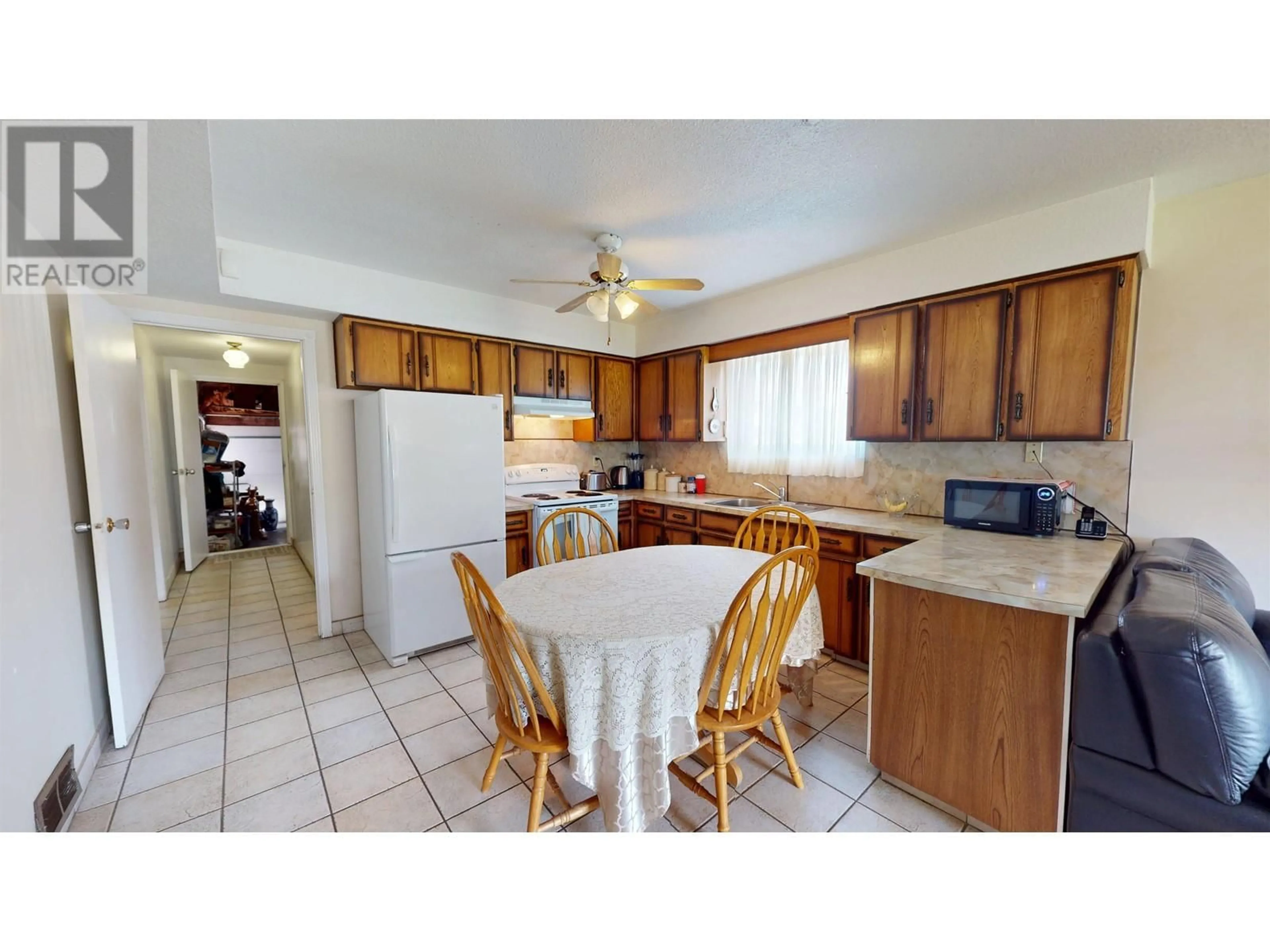 Standard kitchen, ceramic/tile floor for 4205 BEATRICE STREET, Vancouver British Columbia V5N4H9