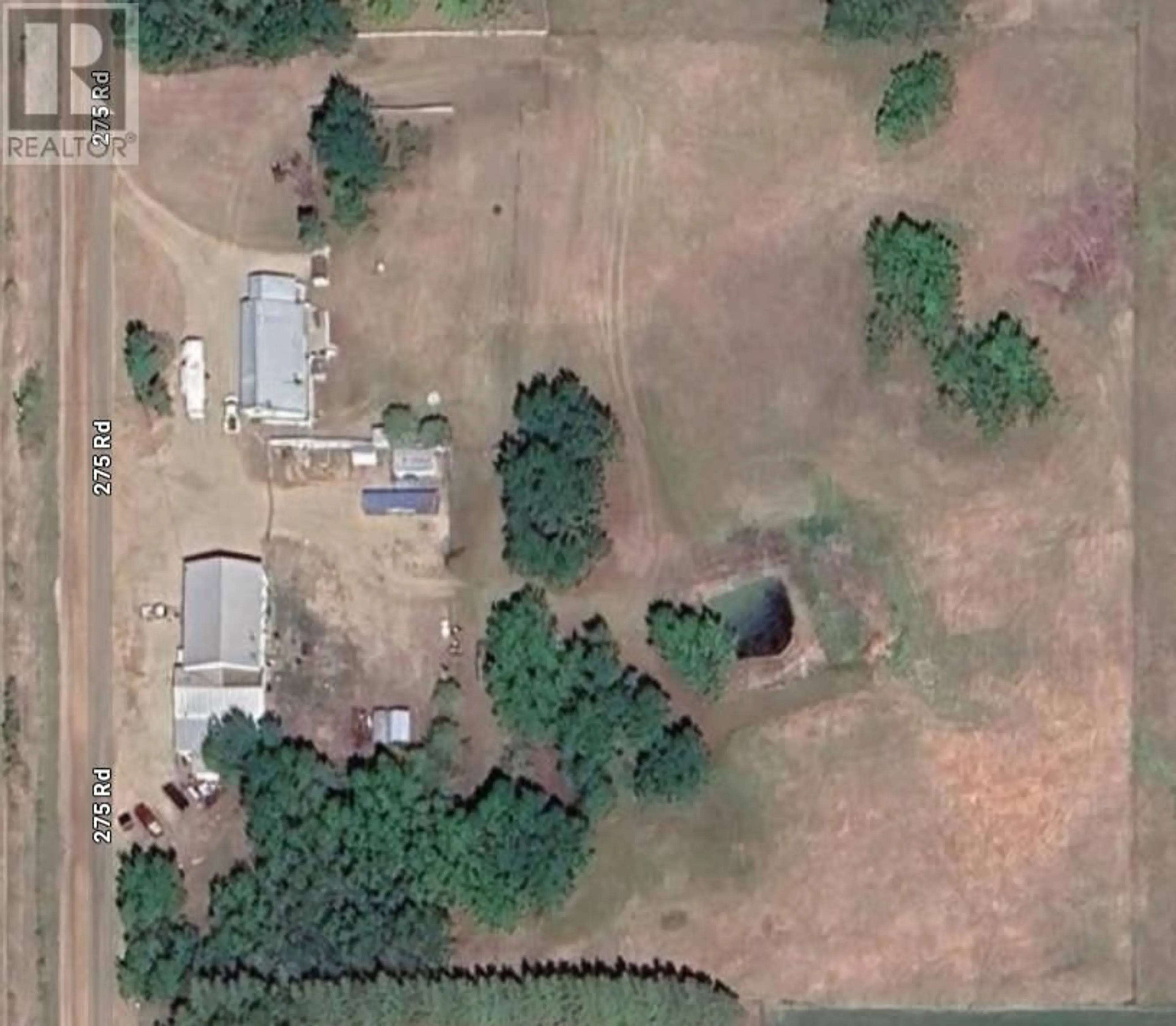 A pic from outside/outdoor area/front of a property/back of a property/a pic from drone, unknown for 12525 275 ROAD, Charlie Lake British Columbia V0C1H0