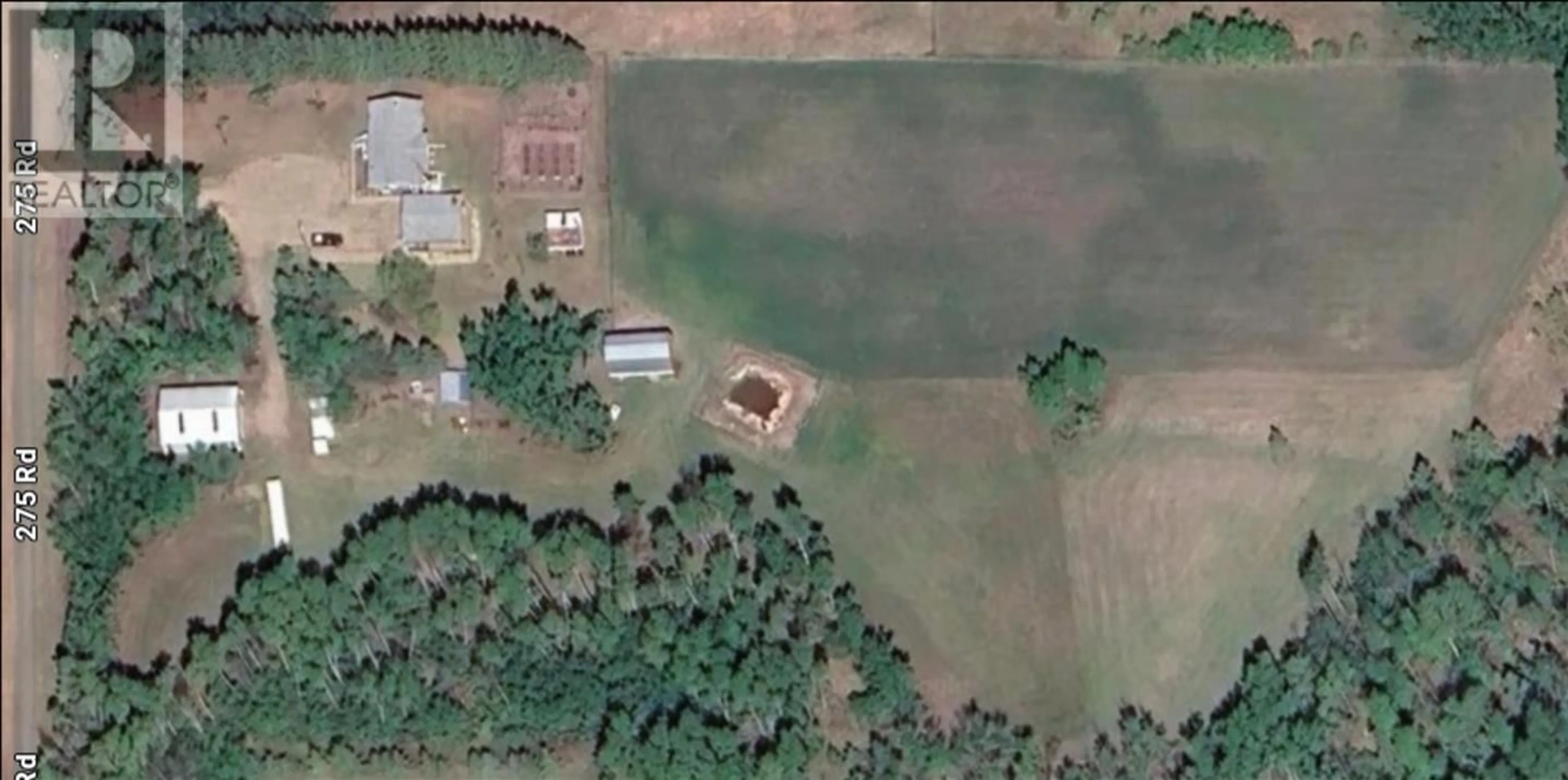 A pic from outside/outdoor area/front of a property/back of a property/a pic from drone, building for 12525 275 ROAD, Charlie Lake British Columbia V0C1H0