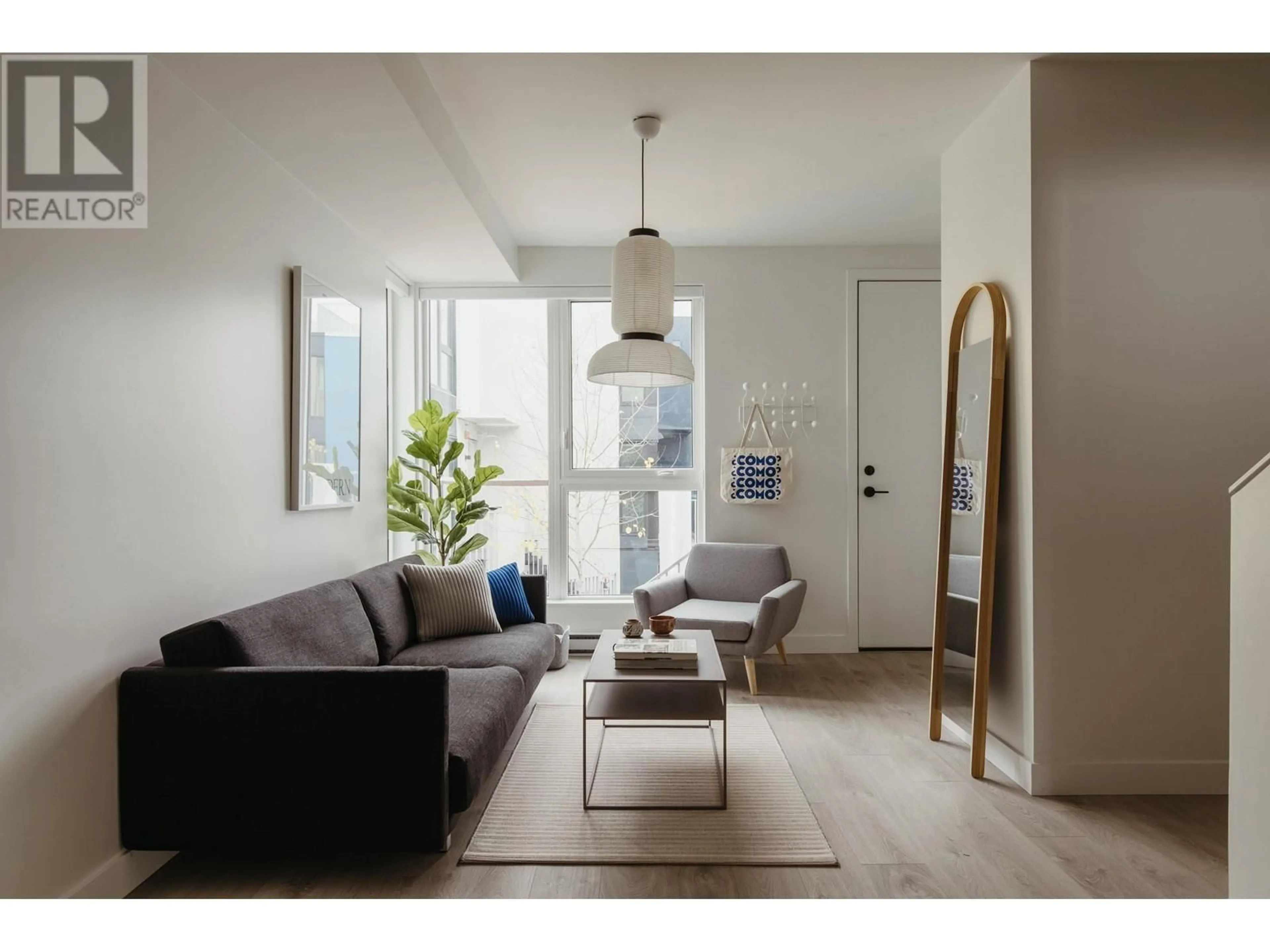 Living room with furniture, unknown for 201 - 322 15TH AVENUE, Vancouver British Columbia V5T0K5