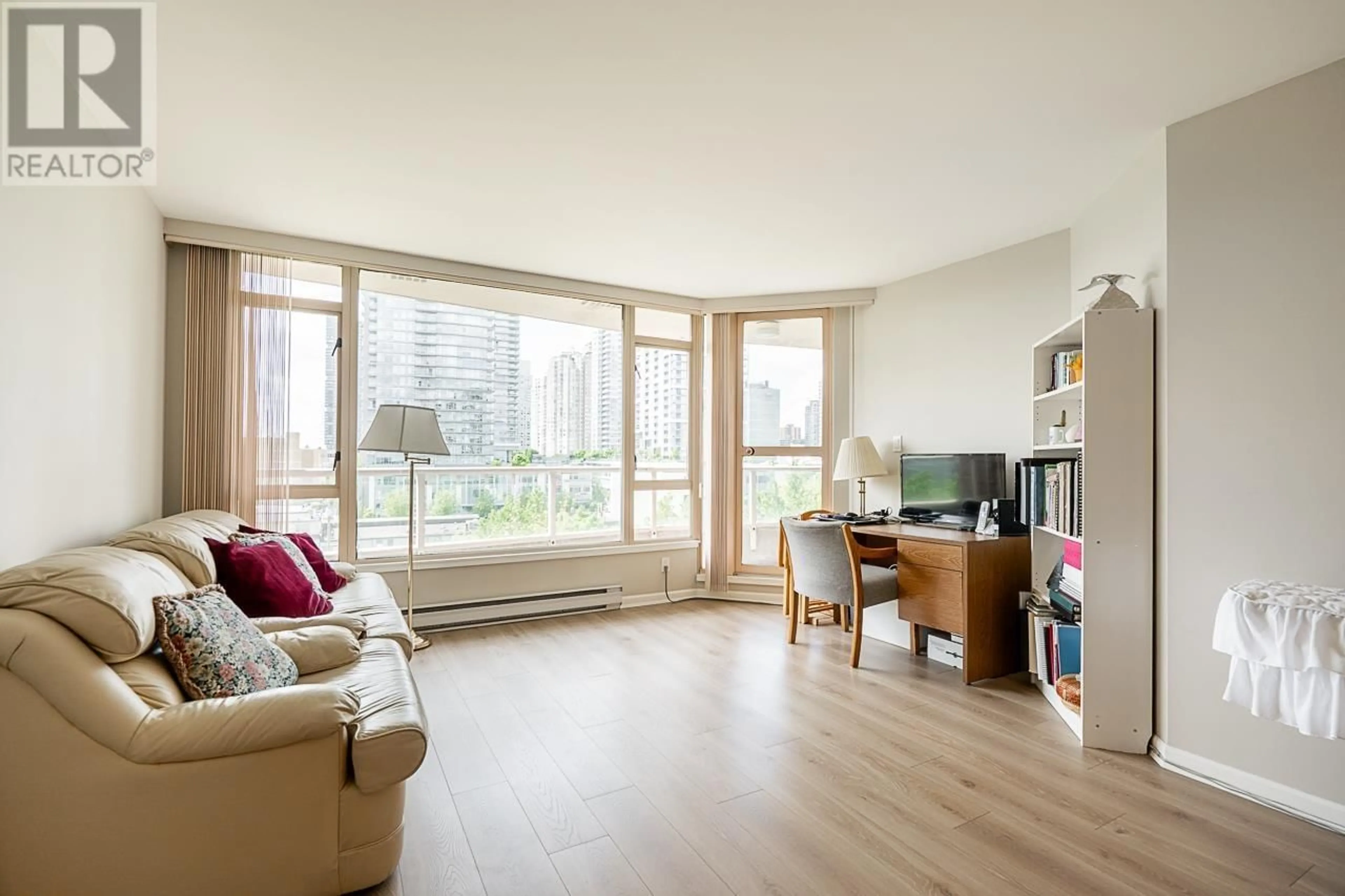 Living room with furniture, wood/laminate floor for 704 - 4657 HAZEL STREET, Burnaby British Columbia V5H4R2