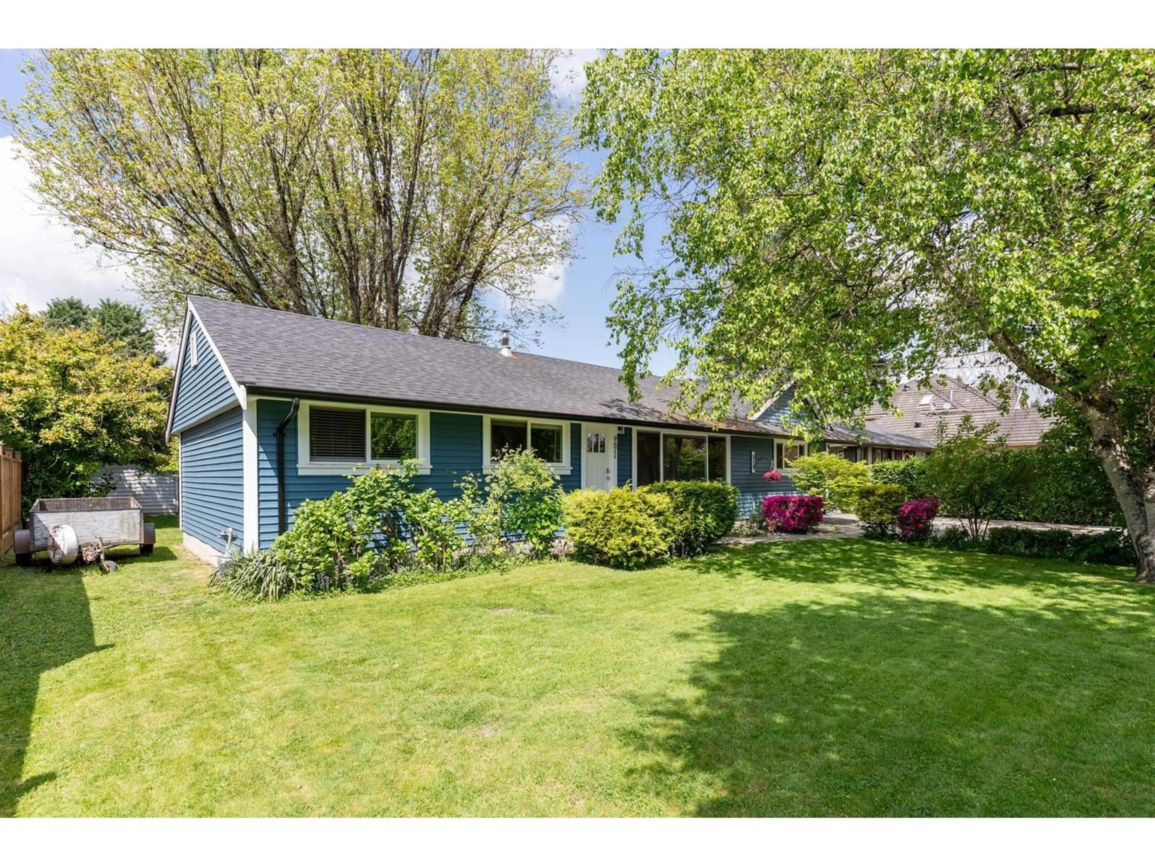 Home with vinyl exterior material, street for 9671 153 A, Surrey British Columbia V3R4J1
