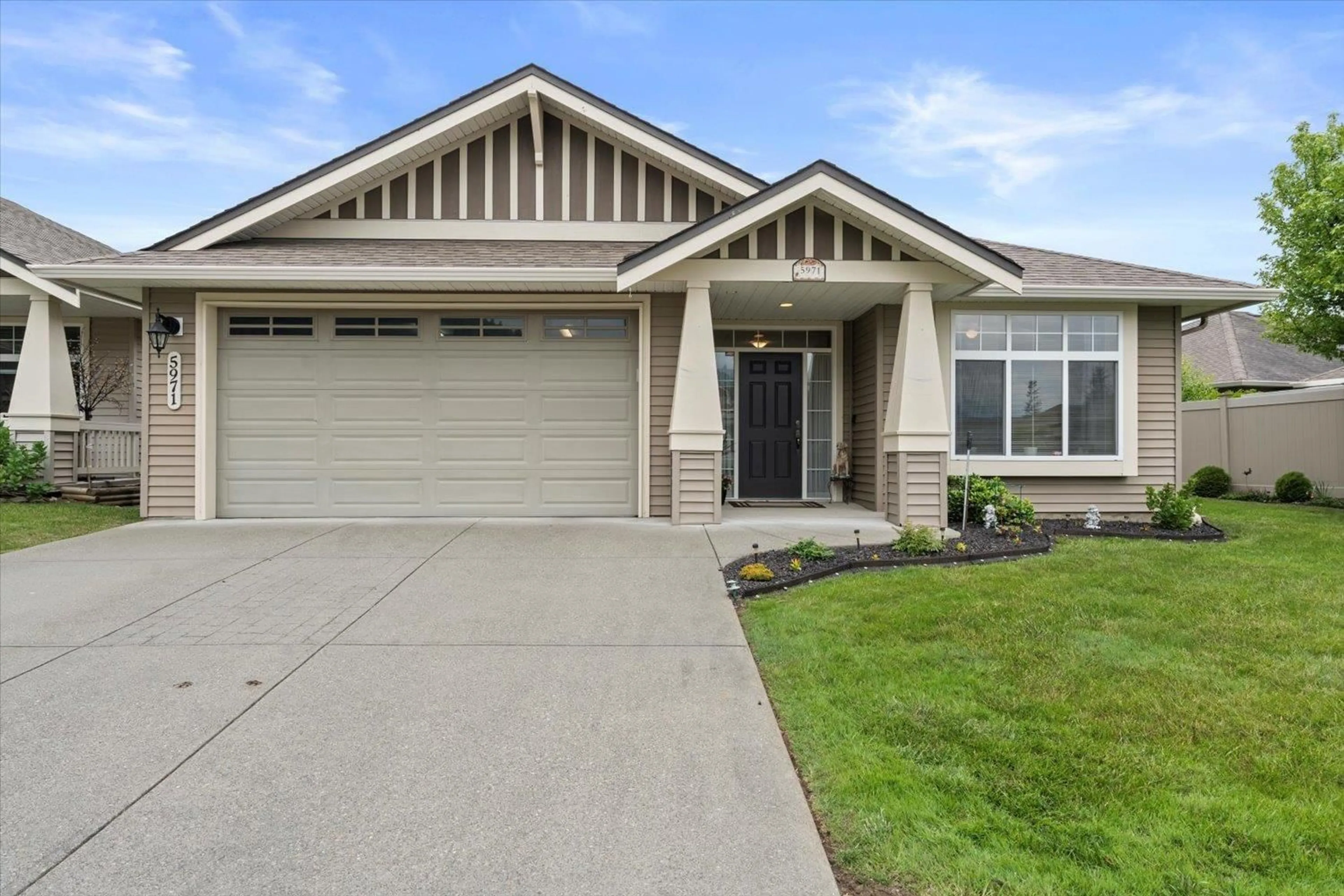 Home with vinyl exterior material, street for 5971 RIVERSTONE STREET, Chilliwack British Columbia V2R0E2