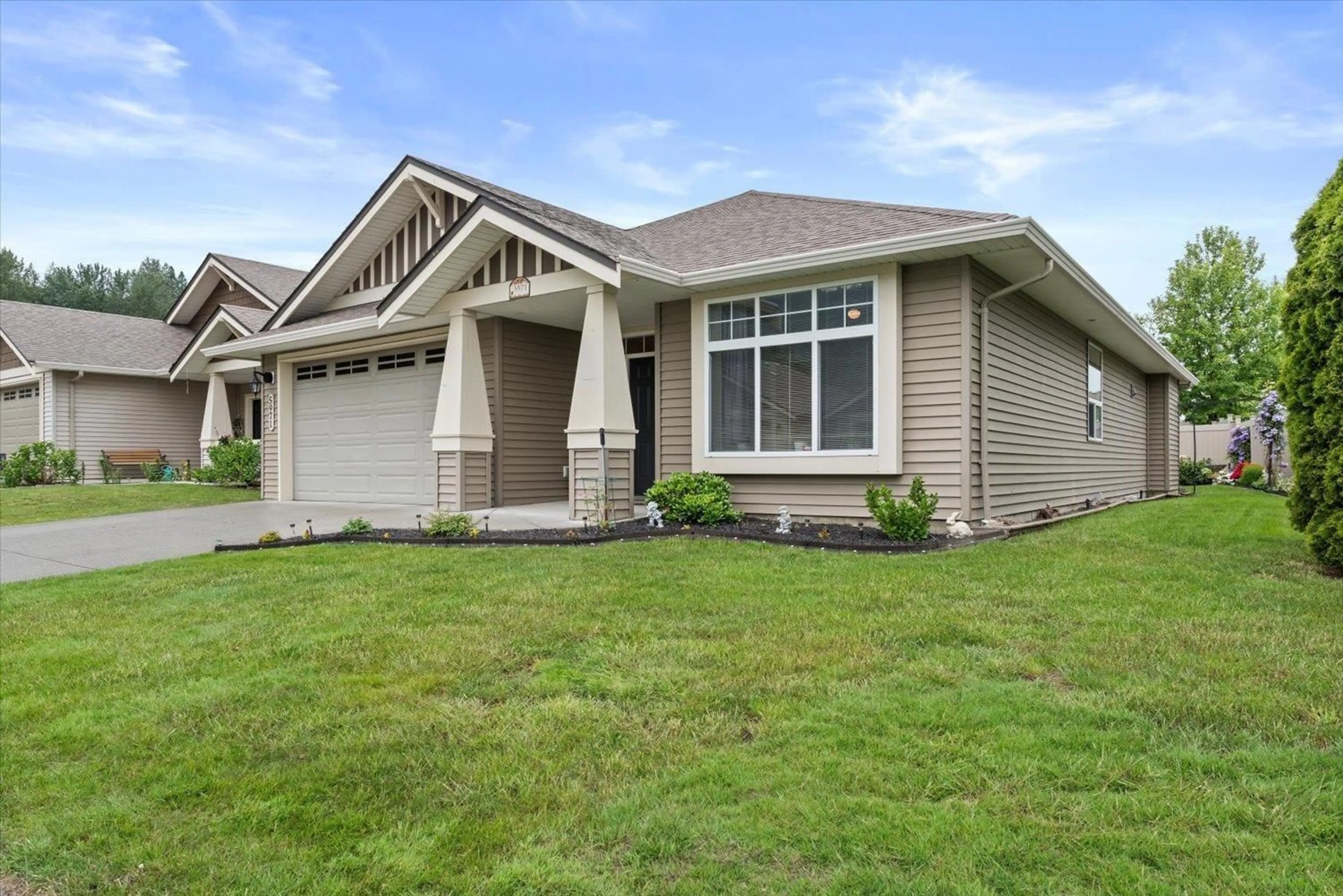 Home with vinyl exterior material, street for 5971 RIVERSTONE STREET, Chilliwack British Columbia V2R0E2