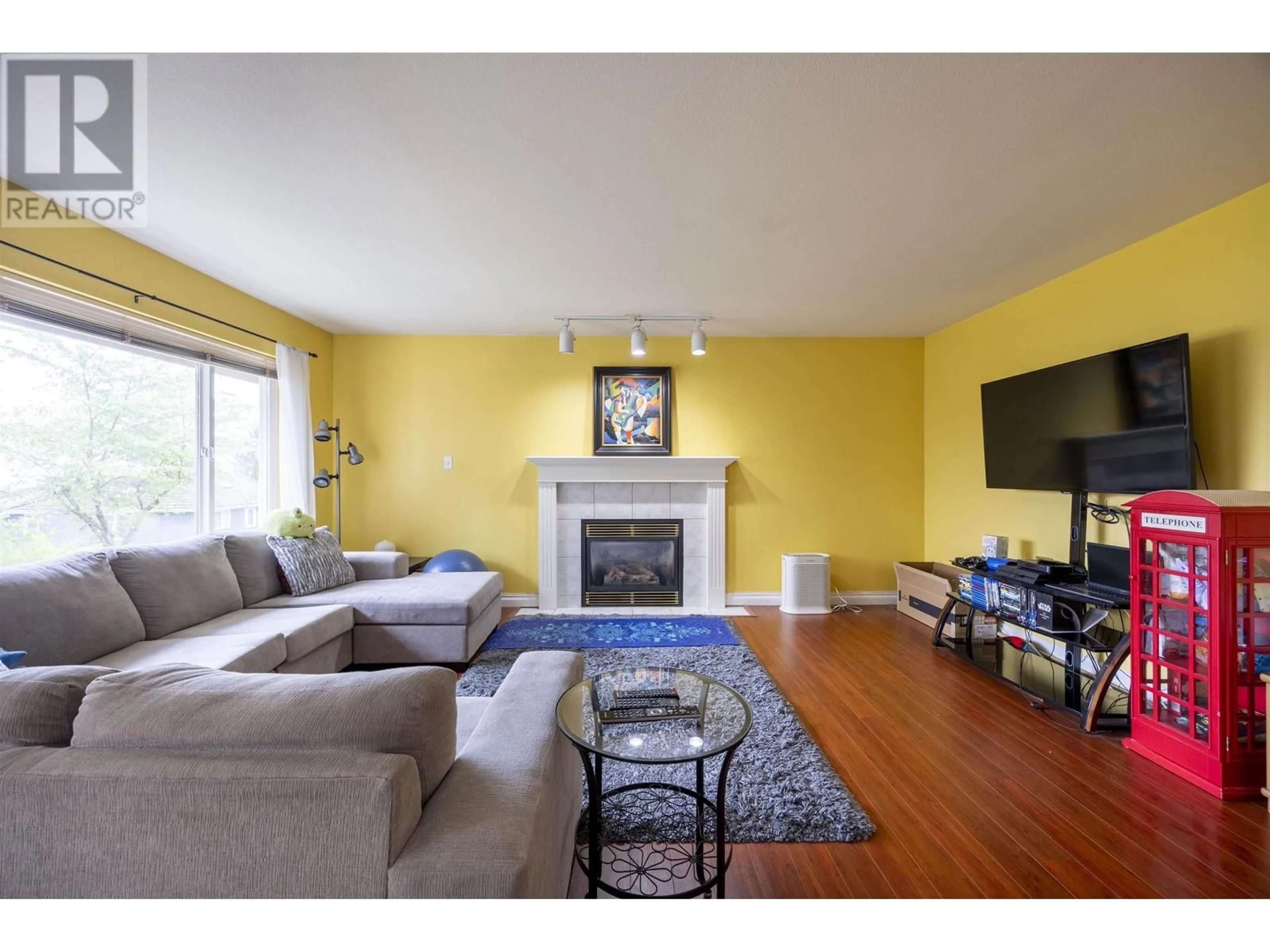 Living room with furniture, wood/laminate floor for 1555 ALPINE LANE, Coquitlam British Columbia V3E3A5