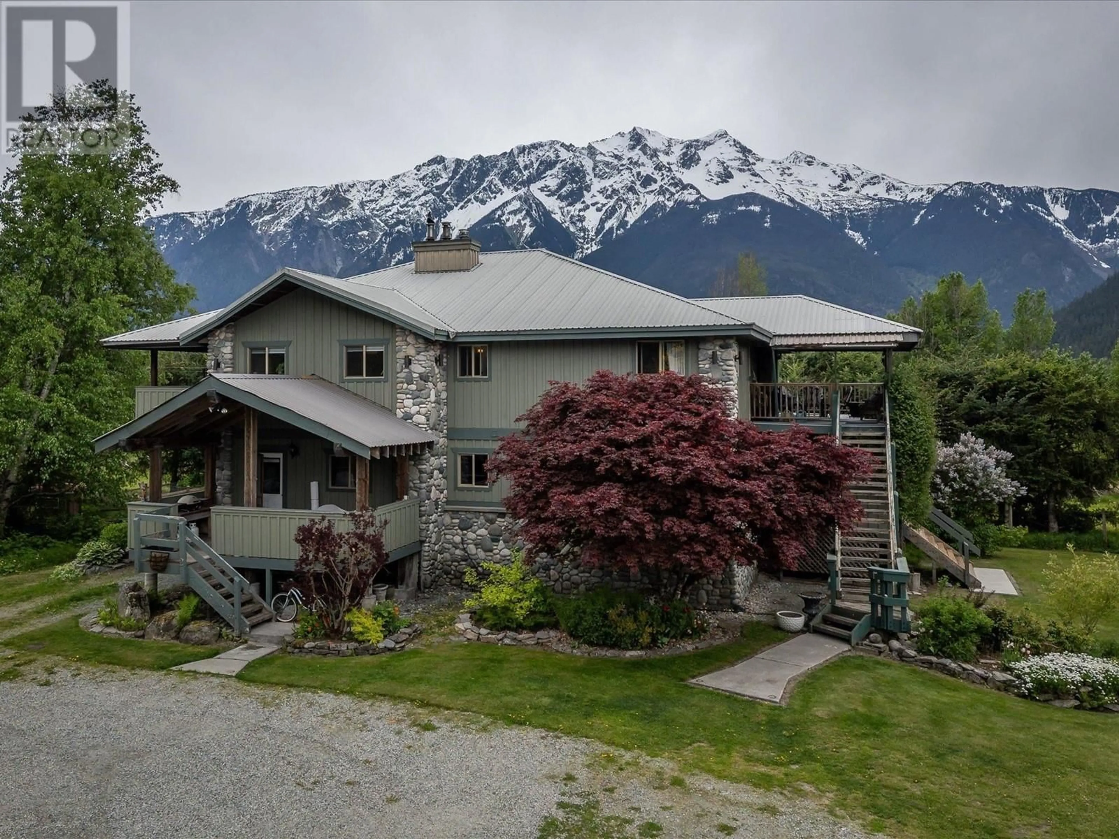 A pic from outside/outdoor area/front of a property/back of a property/a pic from drone, mountain view for 1404 PEMBERTON FARM ROAD, Pemberton British Columbia V0N2L0