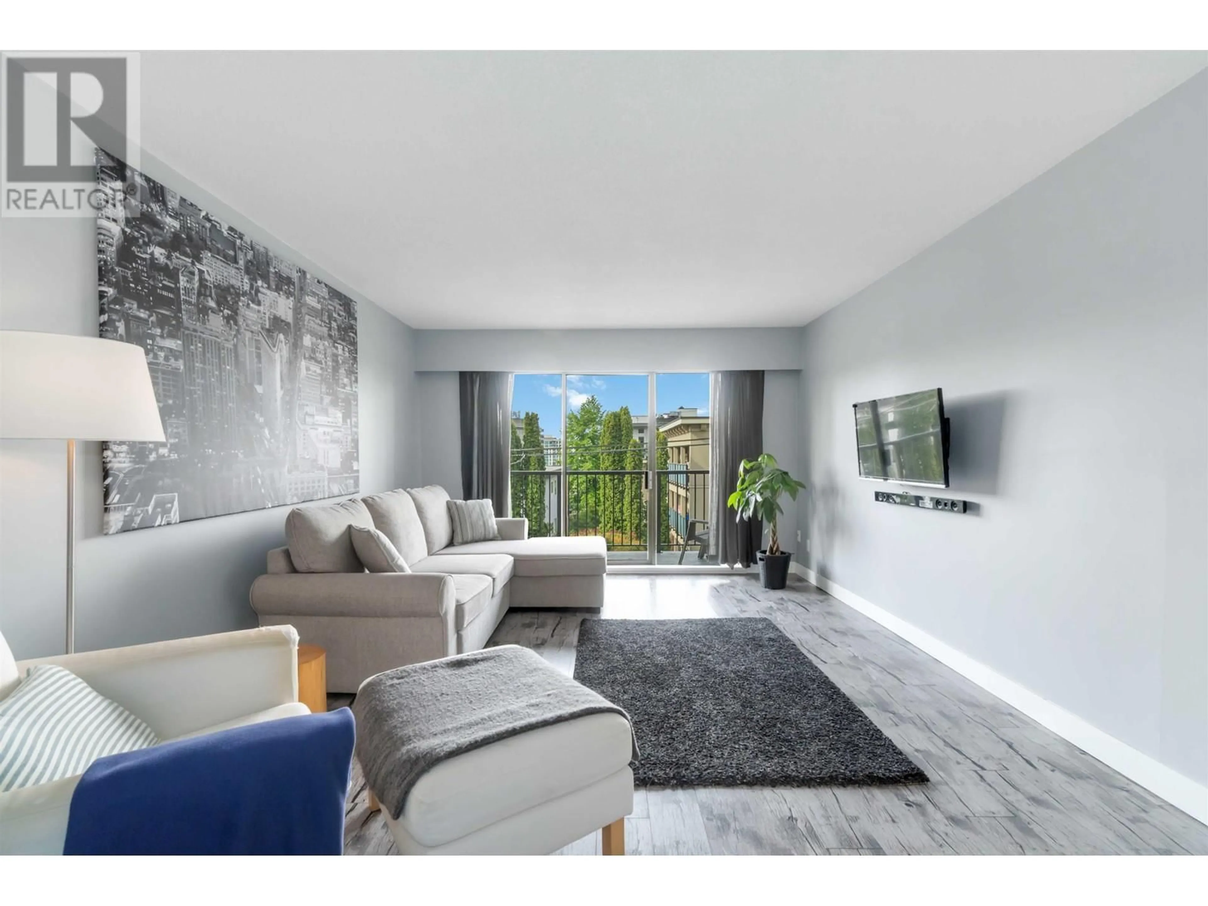 Living room with furniture, unknown for 108 - 155 5TH STREET, North Vancouver British Columbia V7L1L3