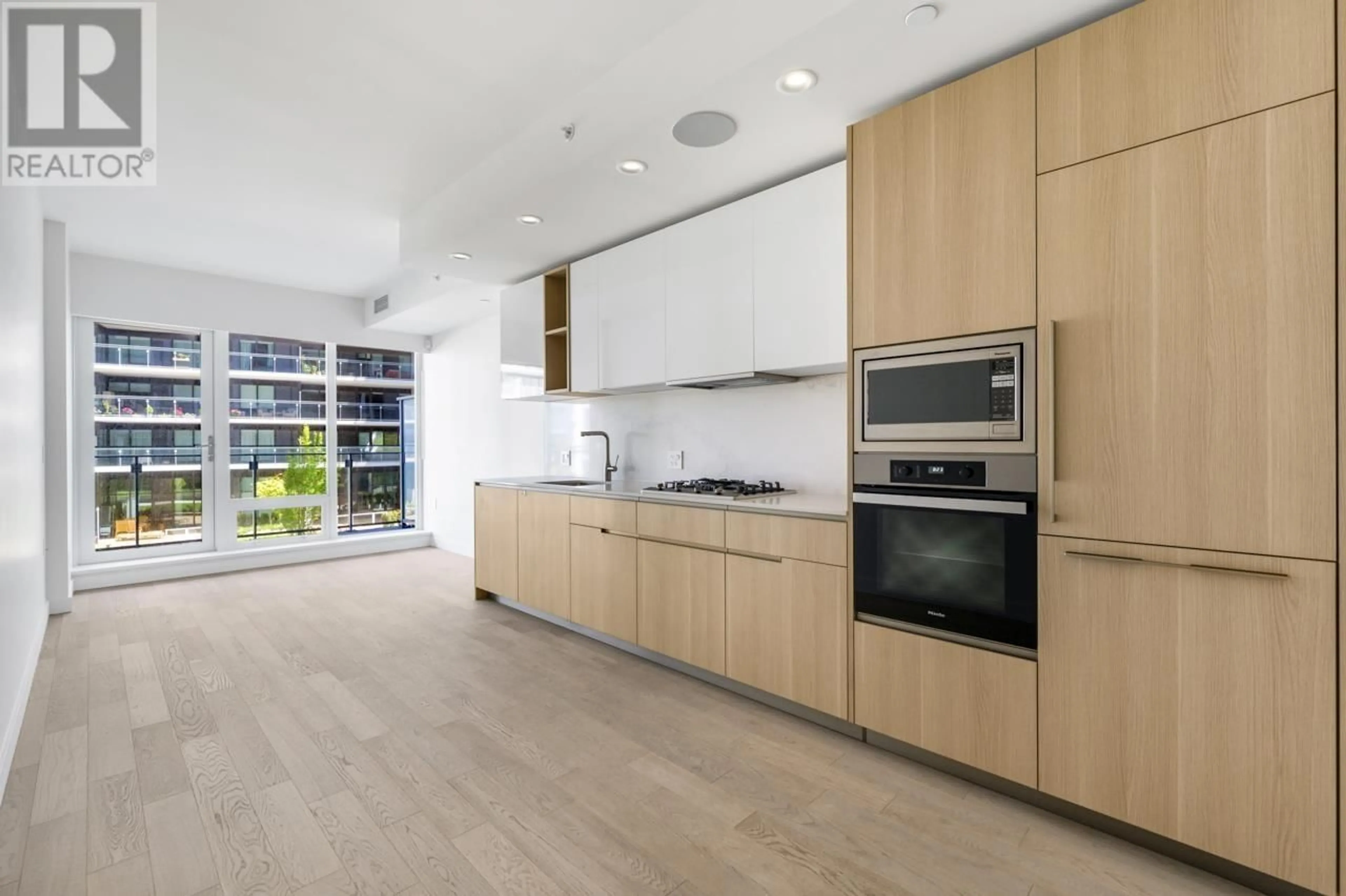 Open concept kitchen, unknown for 205 - 6811 PEARSON WAY, Richmond British Columbia V7C0E7