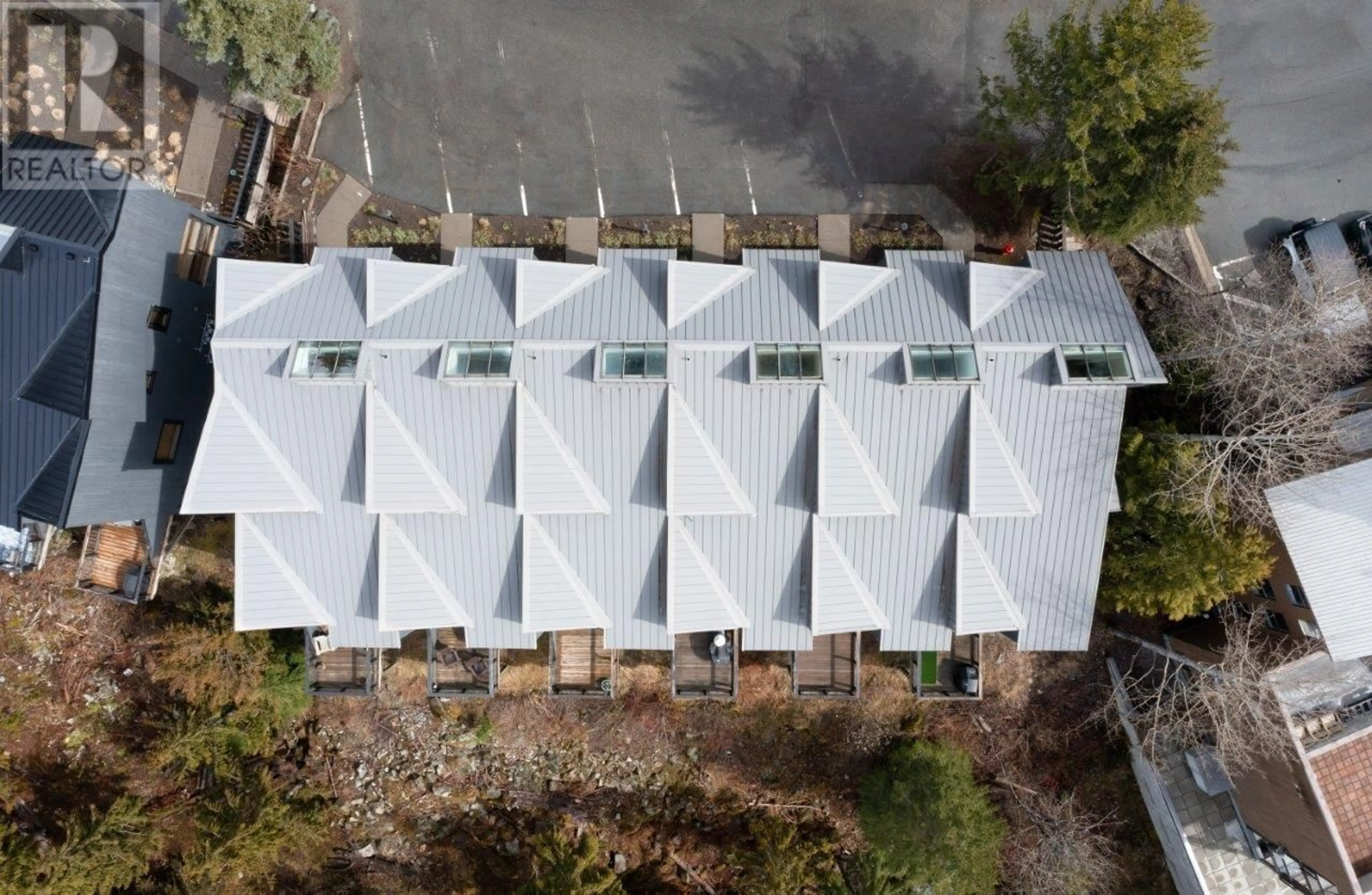 A pic from outside/outdoor area/front of a property/back of a property/a pic from drone, building for 13 - 2221 GONDOLA WAY, Whistler British Columbia V8E0M8