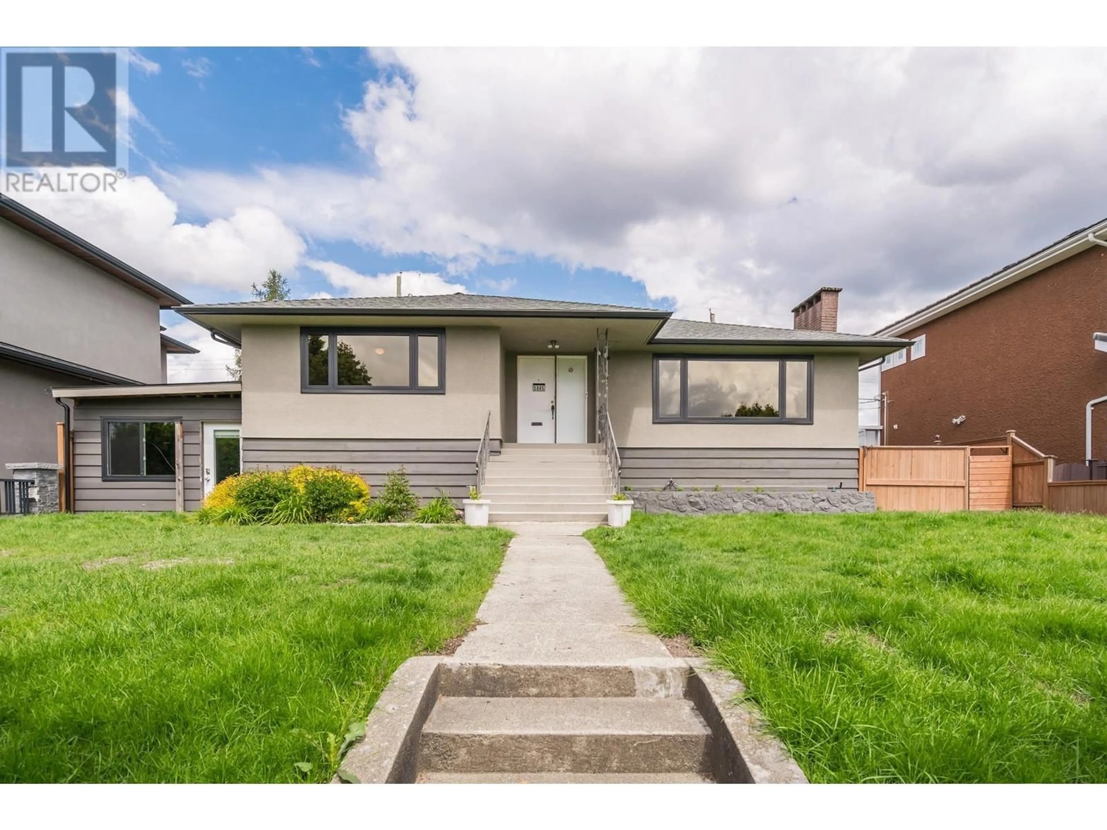 Home with vinyl exterior material, street for 5865 CHARLES STREET, Burnaby British Columbia V5B2G6