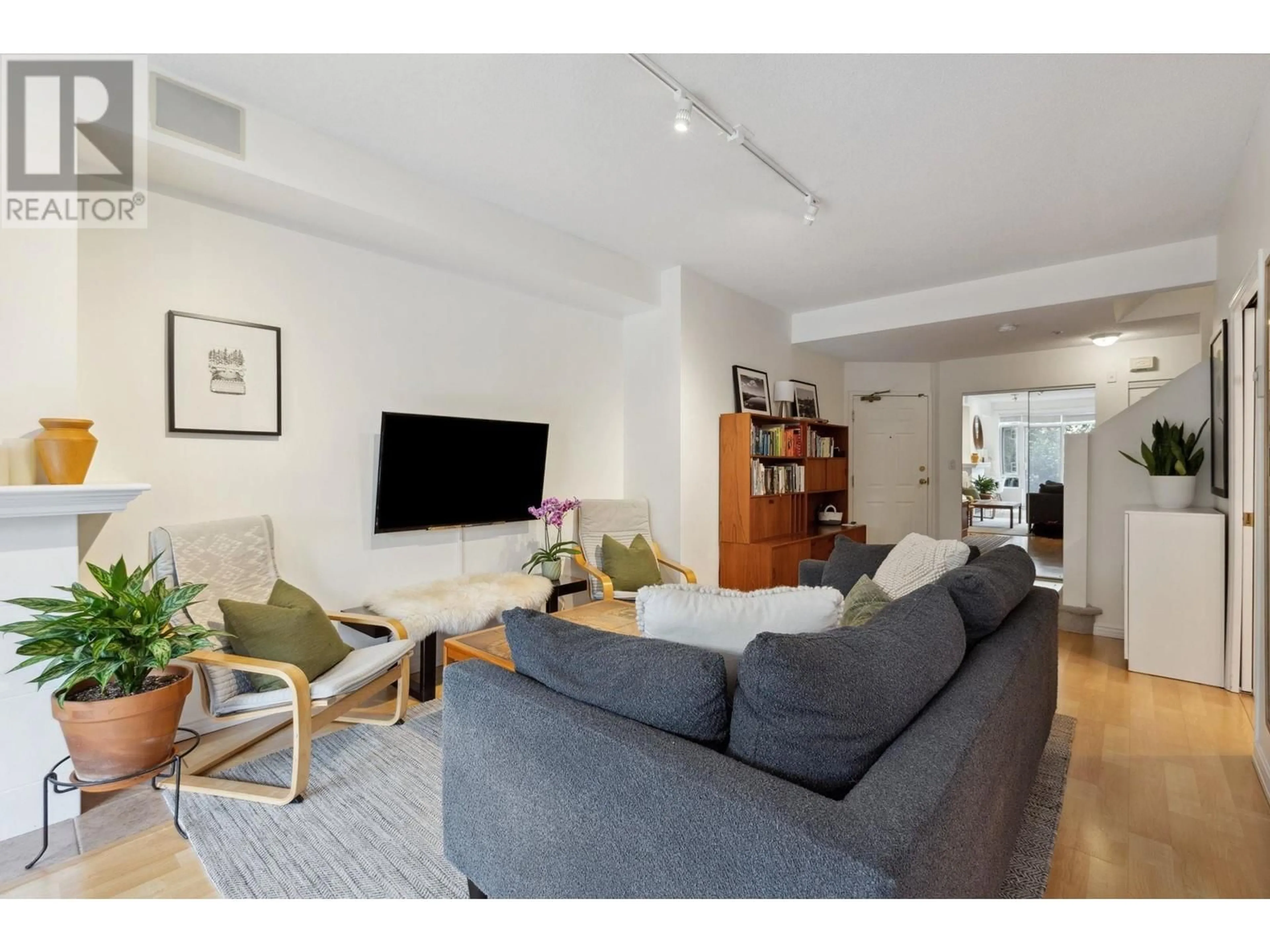 Living room with furniture, unknown for 203 - 3600 WINDCREST DRIVE, North Vancouver British Columbia V7G2S5