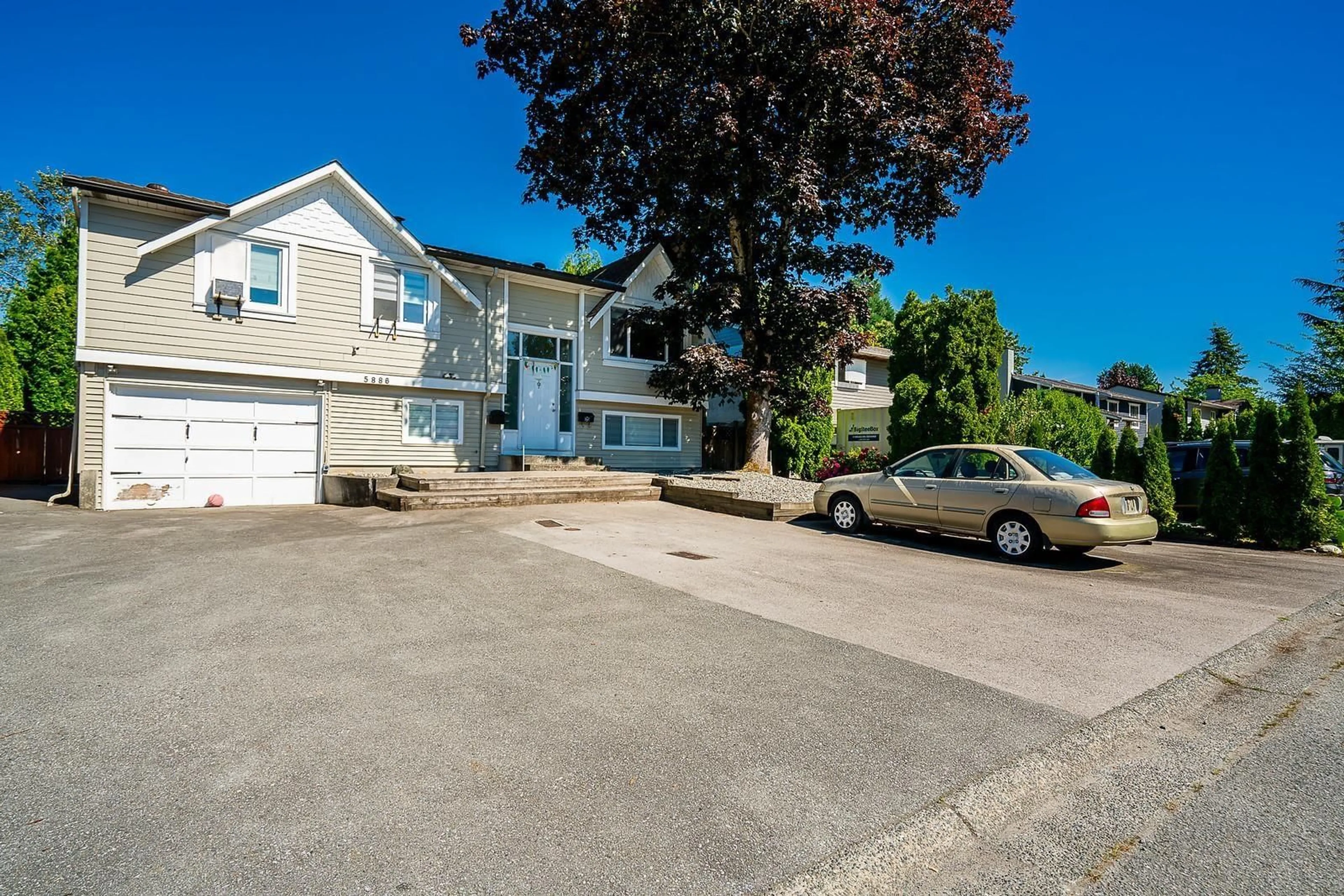 A pic from outside/outdoor area/front of a property/back of a property/a pic from drone, street for 5886 184A, Surrey British Columbia V3S5S7