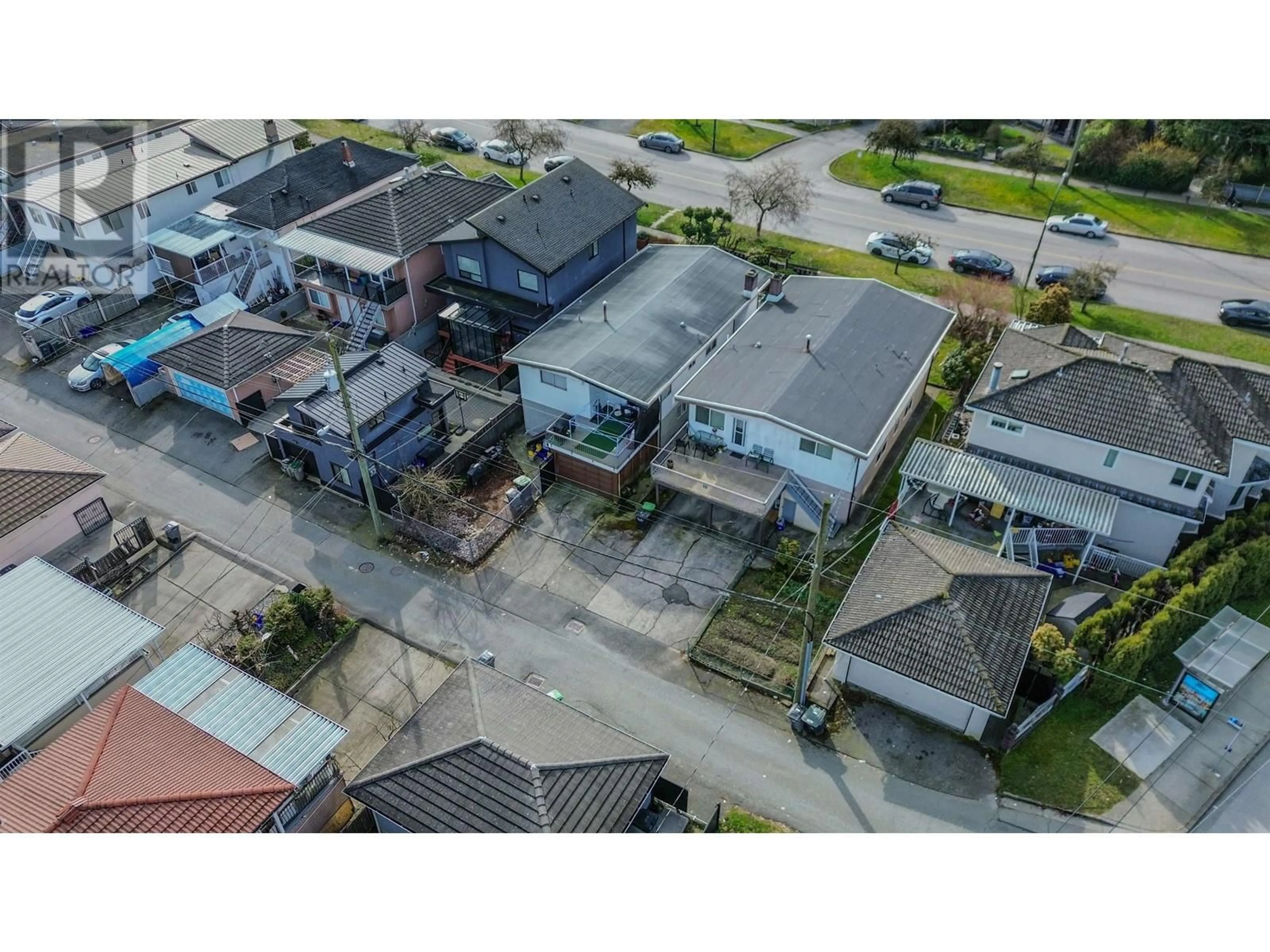 A pic from outside/outdoor area/front of a property/back of a property/a pic from drone, street for 3011 29TH STREET, Vancouver British Columbia V5R1V9