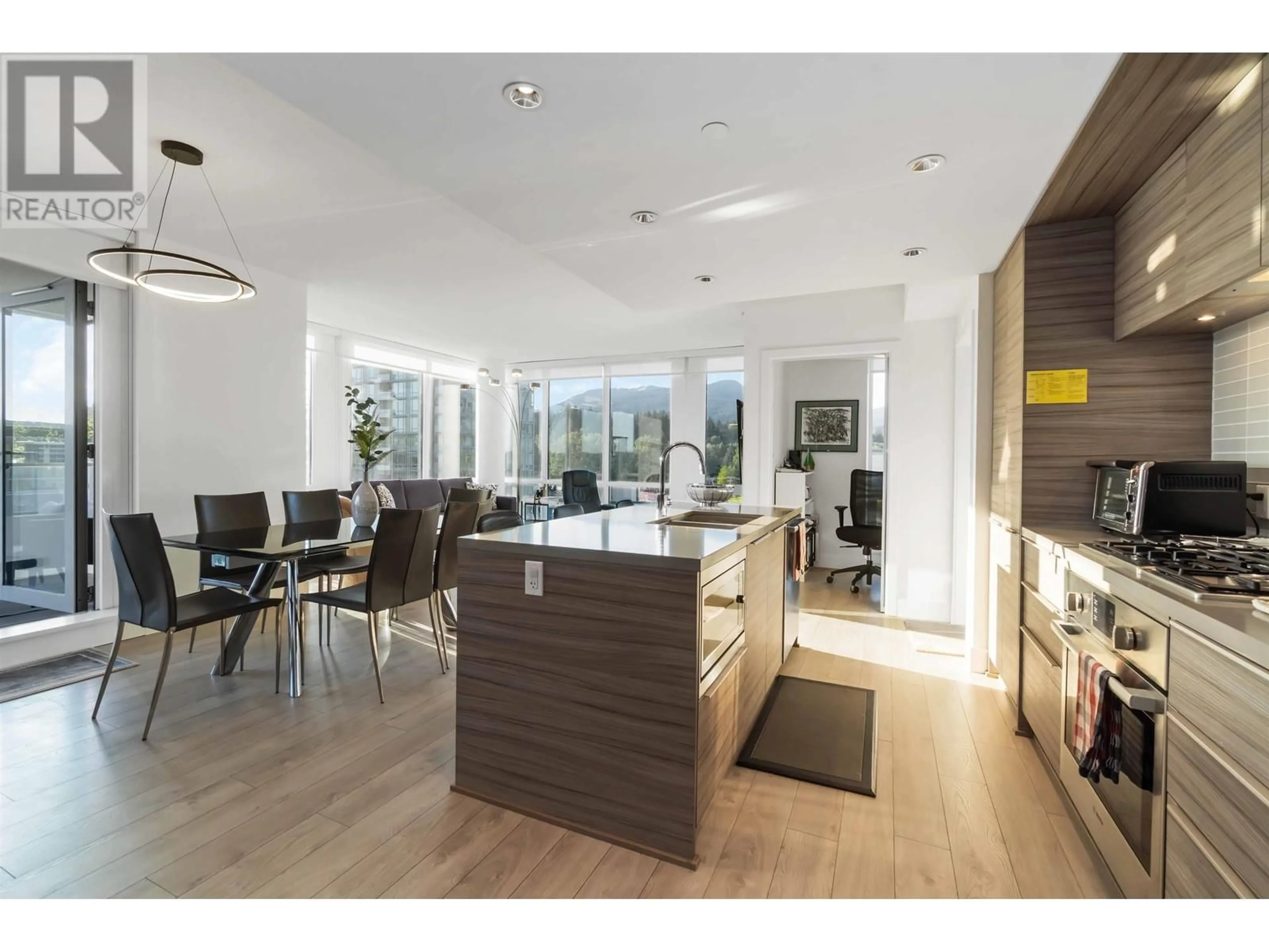 Open concept kitchen, wood/laminate floor for 808 - 1550 FERN STREET, North Vancouver British Columbia V7J0A9
