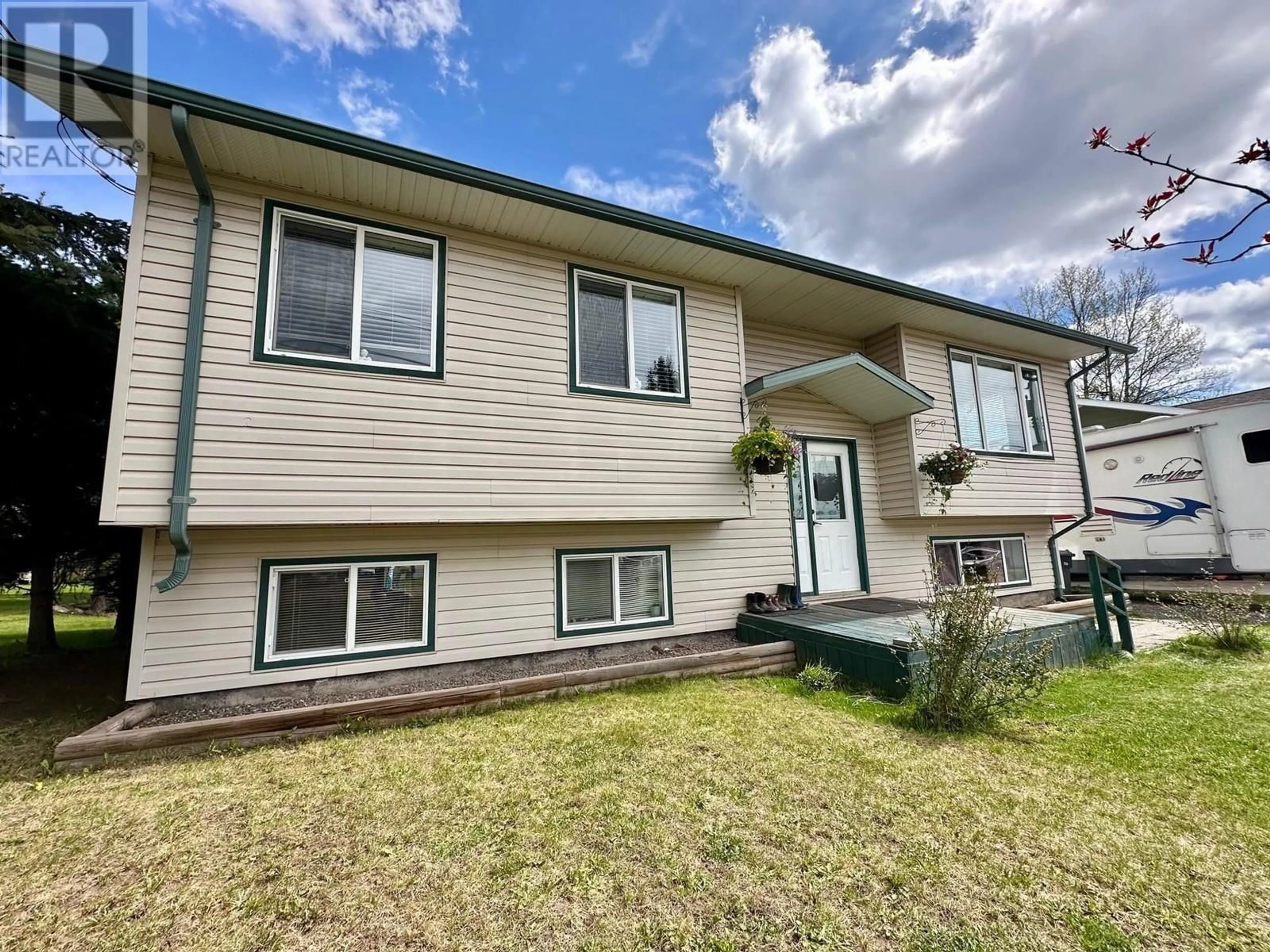Home with vinyl exterior material, street for 1630 TELEGRAPH STREET, Telkwa British Columbia V0J2X0