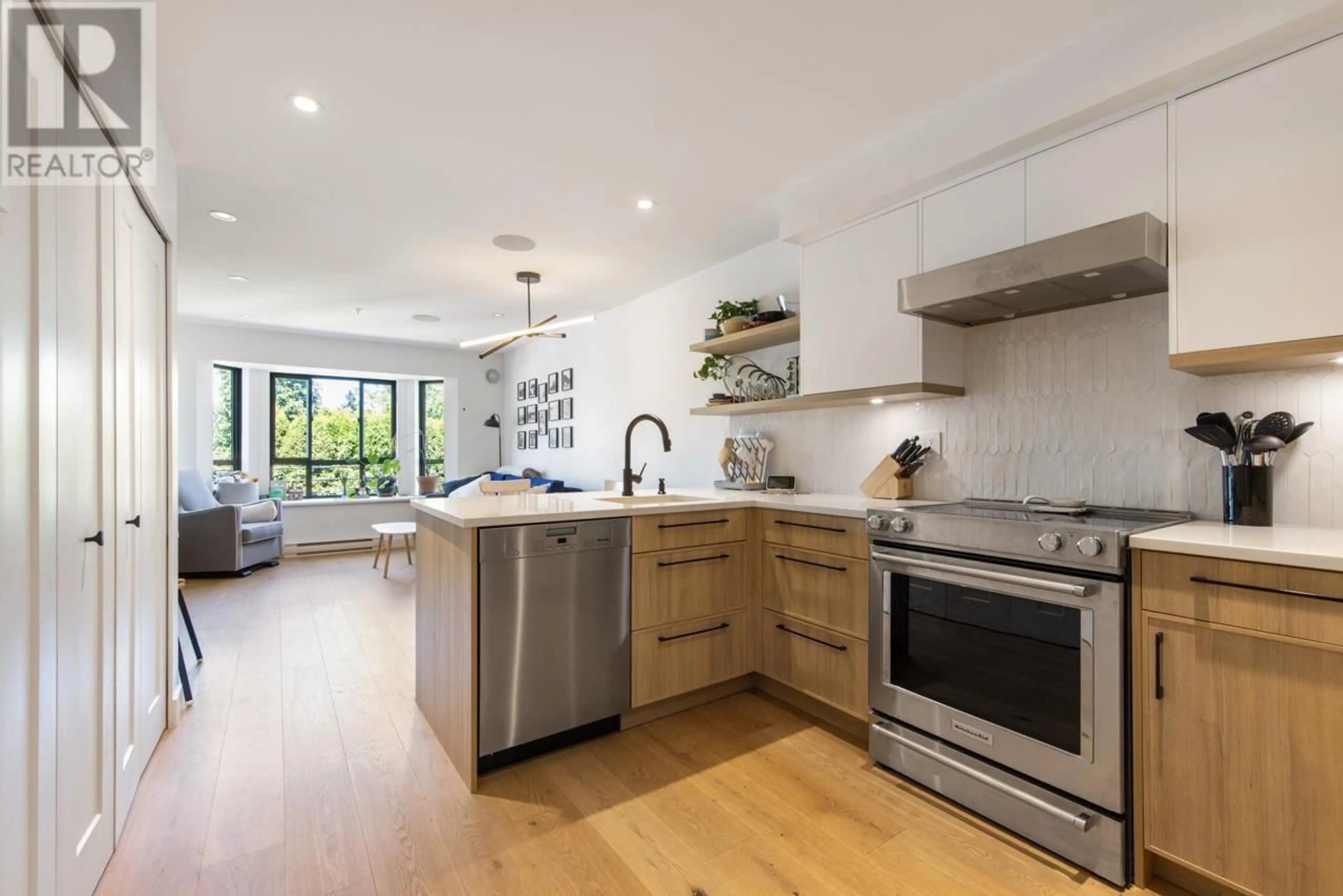 Open concept kitchen, unknown for 240 - 2565 BROADWAY AVENUE, Vancouver British Columbia V6K2E9