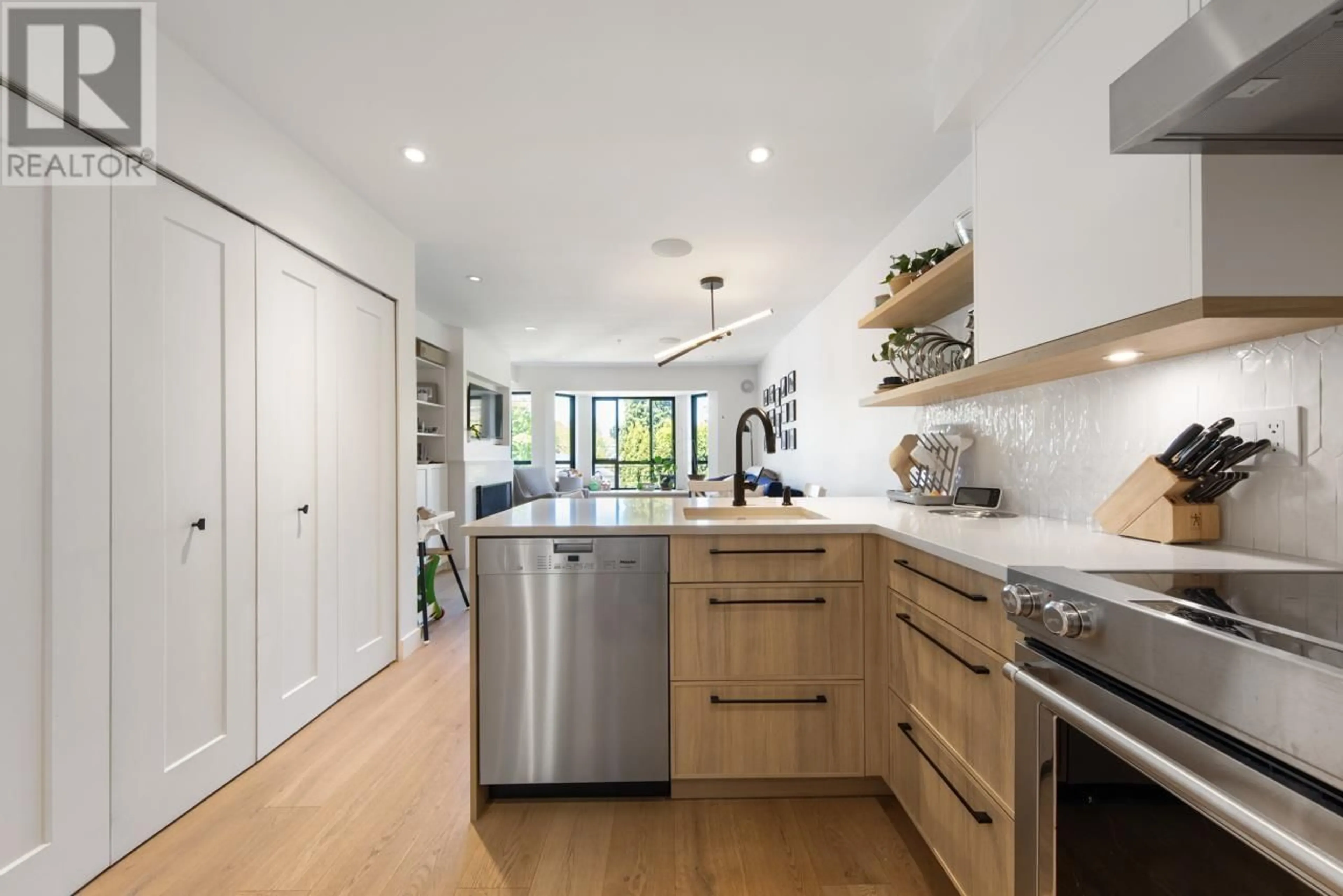 Open concept kitchen, unknown for 240 - 2565 BROADWAY AVENUE, Vancouver British Columbia V6K2E9