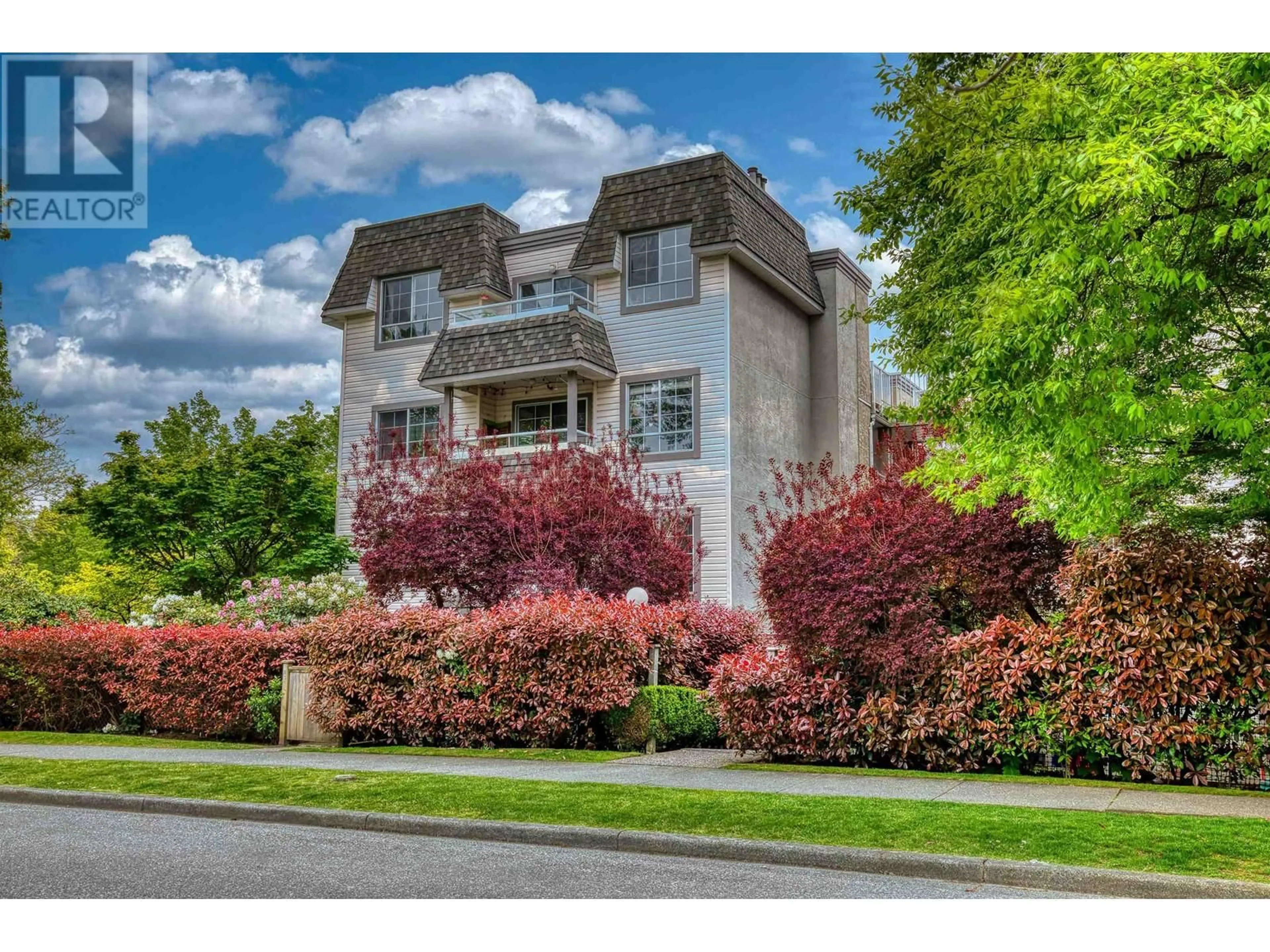Home with brick exterior material, street for 105 - 1950 11TH AVENUE, Vancouver British Columbia V5N1Z2