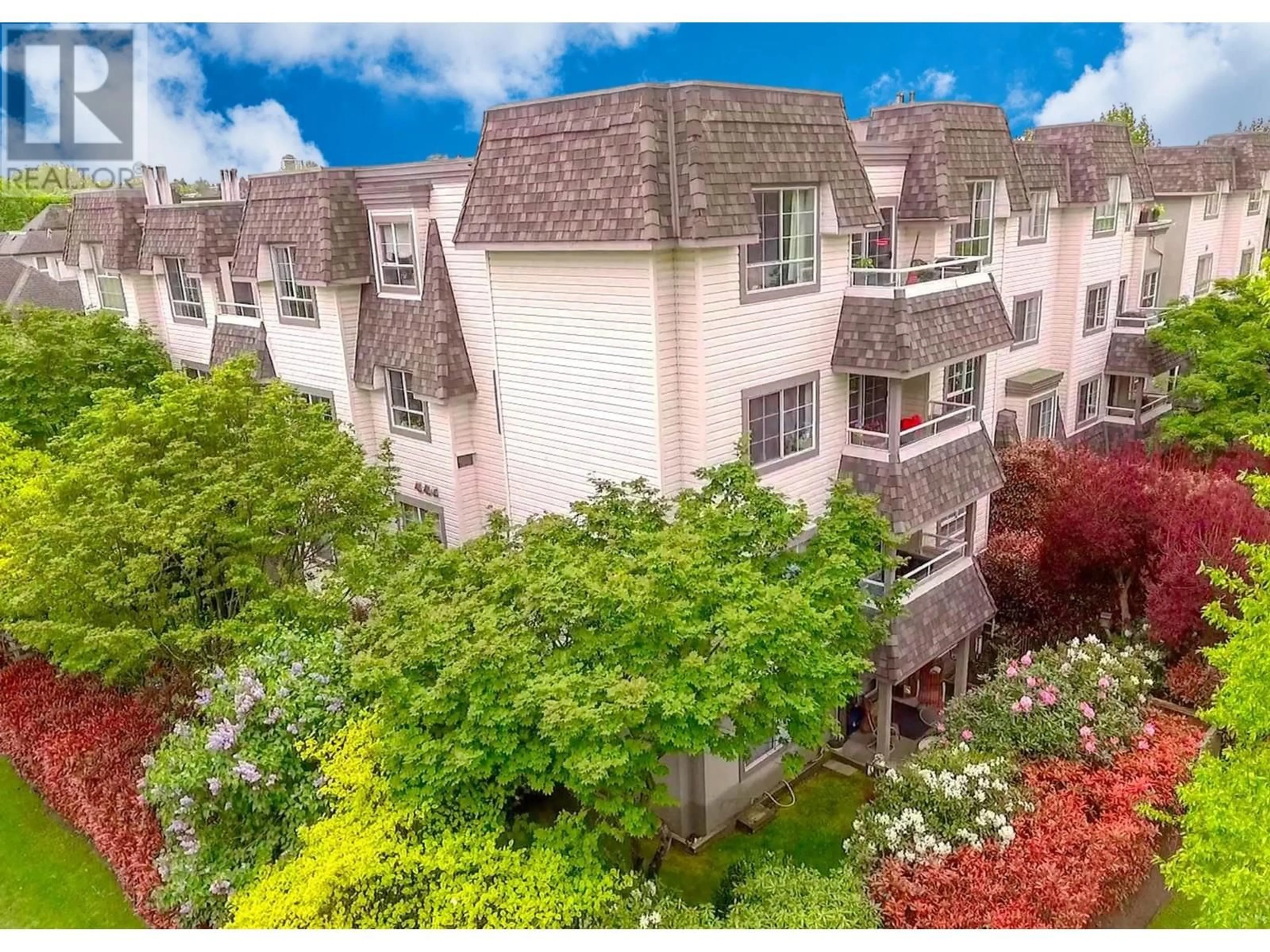 A pic from outside/outdoor area/front of a property/back of a property/a pic from drone, unknown for 105 - 1950 11TH AVENUE, Vancouver British Columbia V5N1Z2