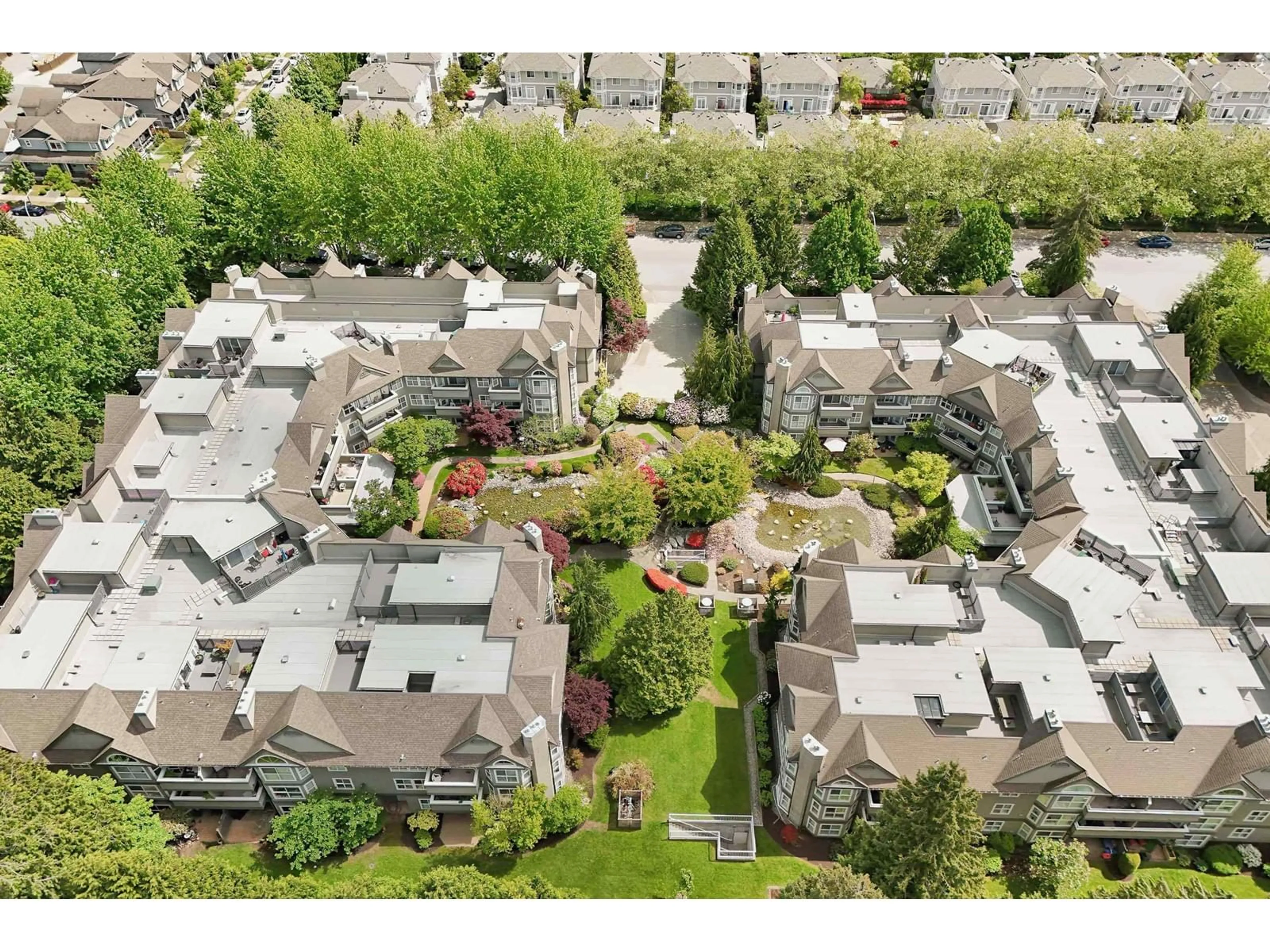 A pic from outside/outdoor area/front of a property/back of a property/a pic from drone, unknown for 112 - 12088 66, Surrey British Columbia V3W1Z9