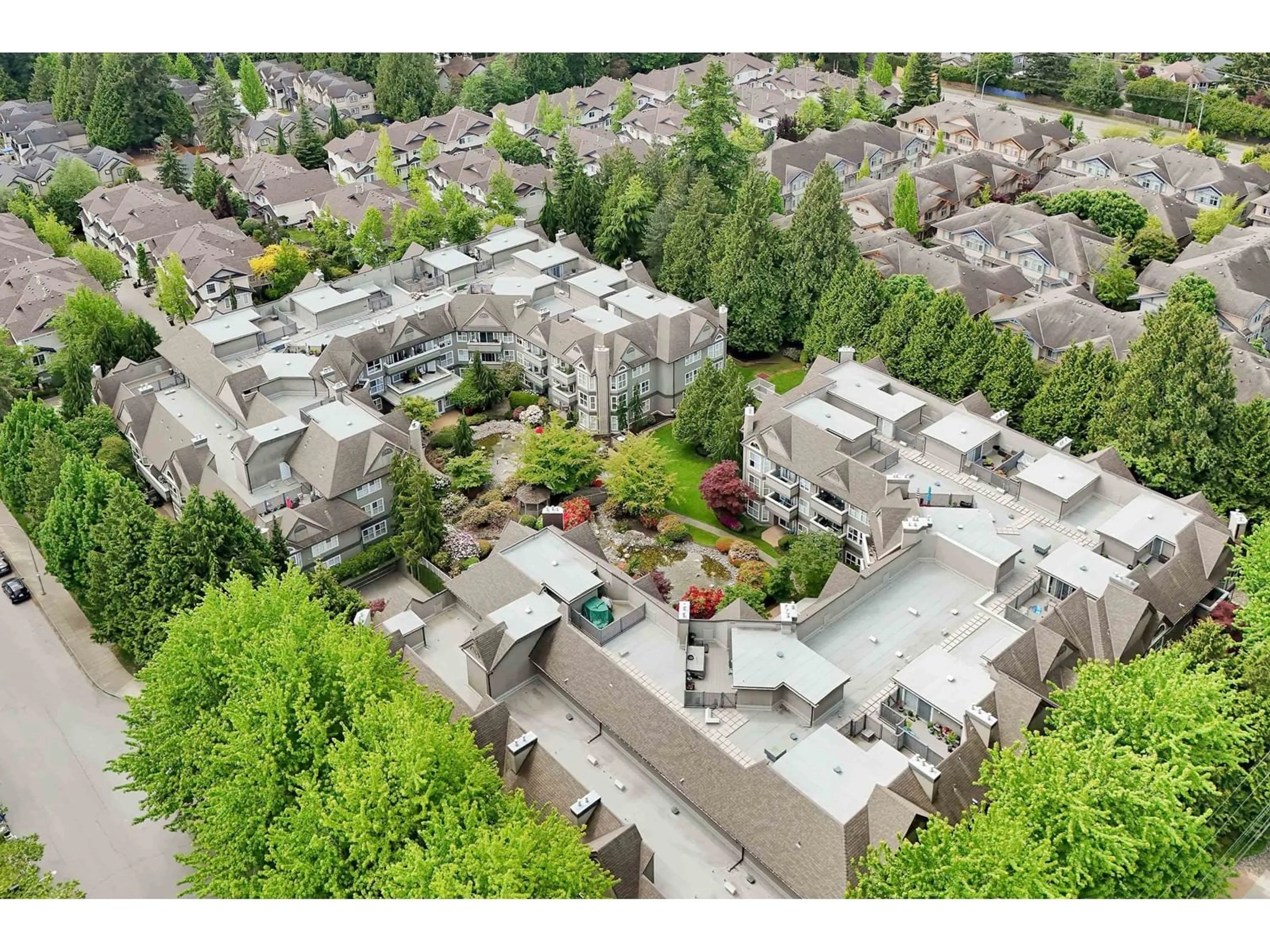 A pic from outside/outdoor area/front of a property/back of a property/a pic from drone, mountain view for 112 - 12088 66, Surrey British Columbia V3W1Z9