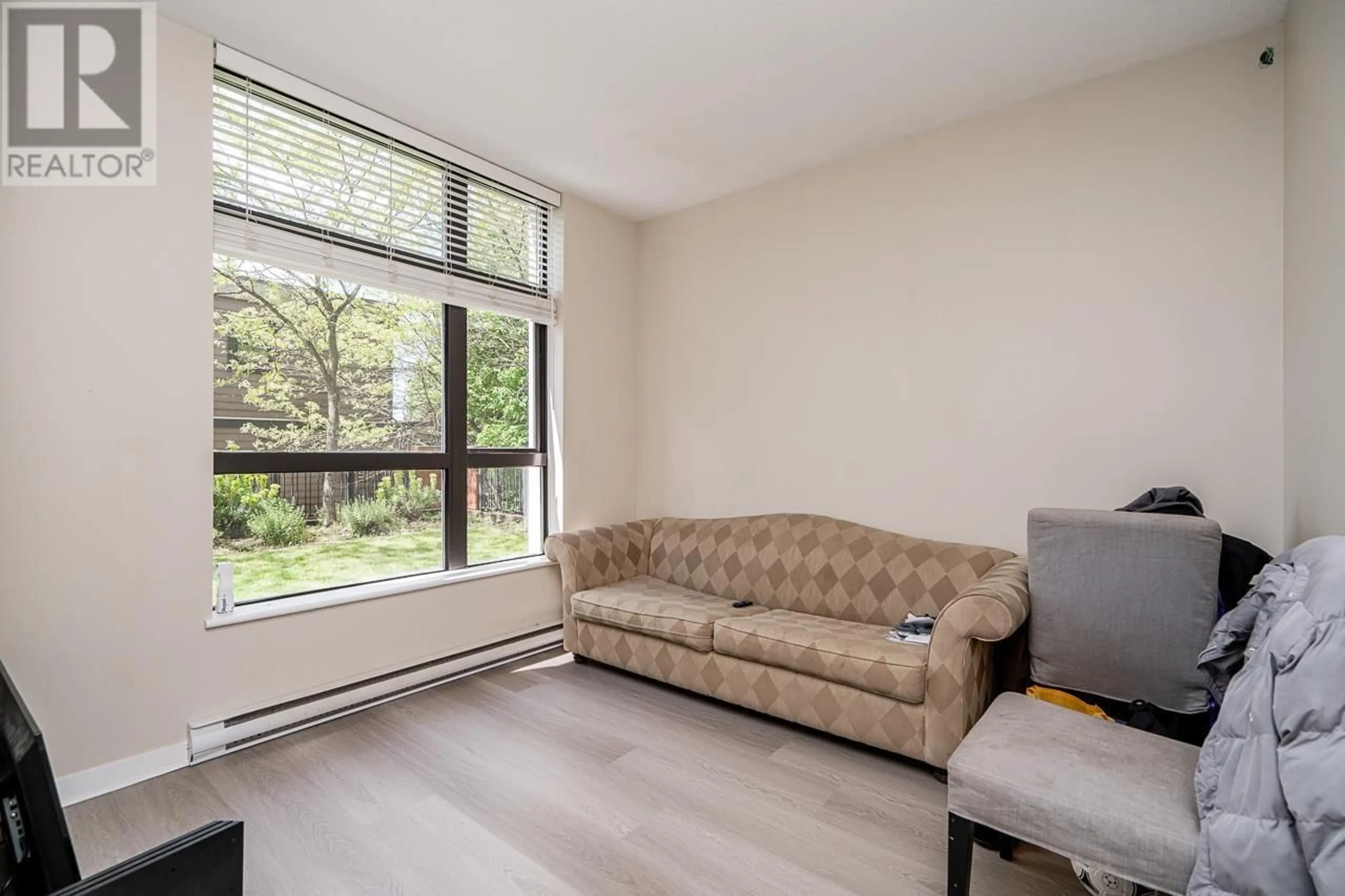 Living room with furniture, unknown for 101 - 814 ROYAL AVENUE, New Westminster British Columbia V3M1J9