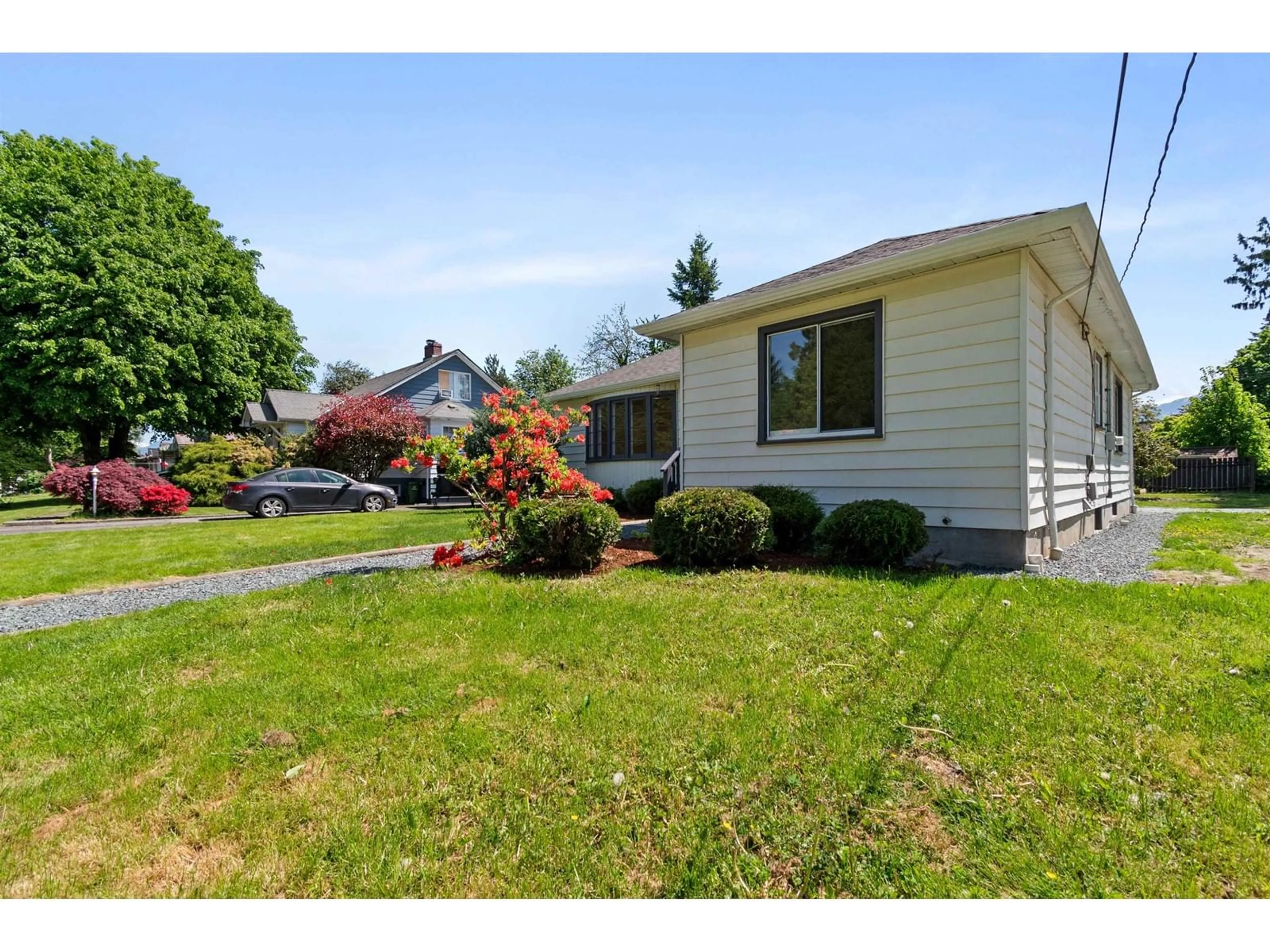 Home with vinyl exterior material, street for 46124 MELLARD AVENUE, Chilliwack British Columbia V2P2Y9