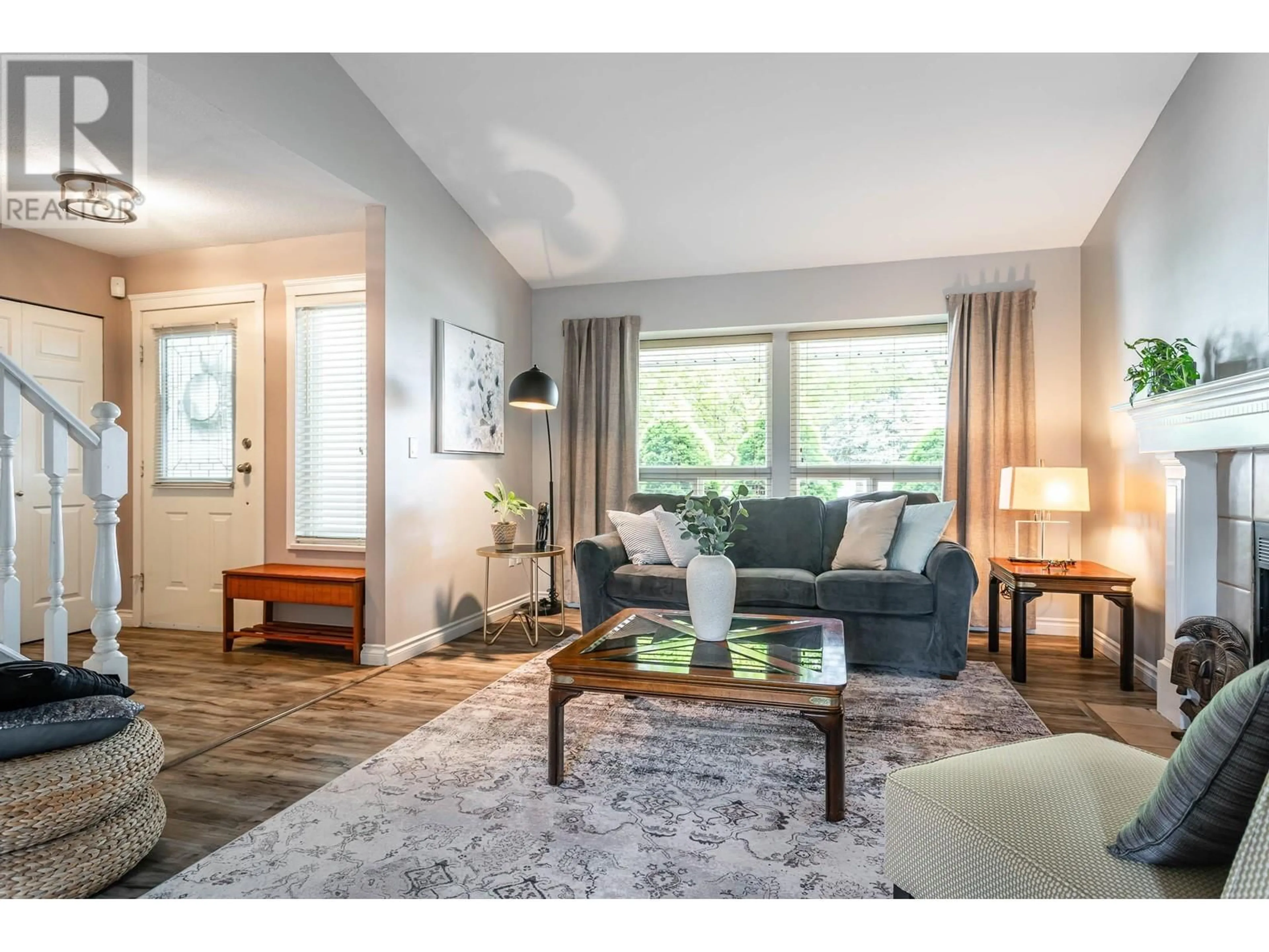 Living room with furniture, wood/laminate floor for 19660 SOMERSET DRIVE, Pitt Meadows British Columbia V3Y2E2