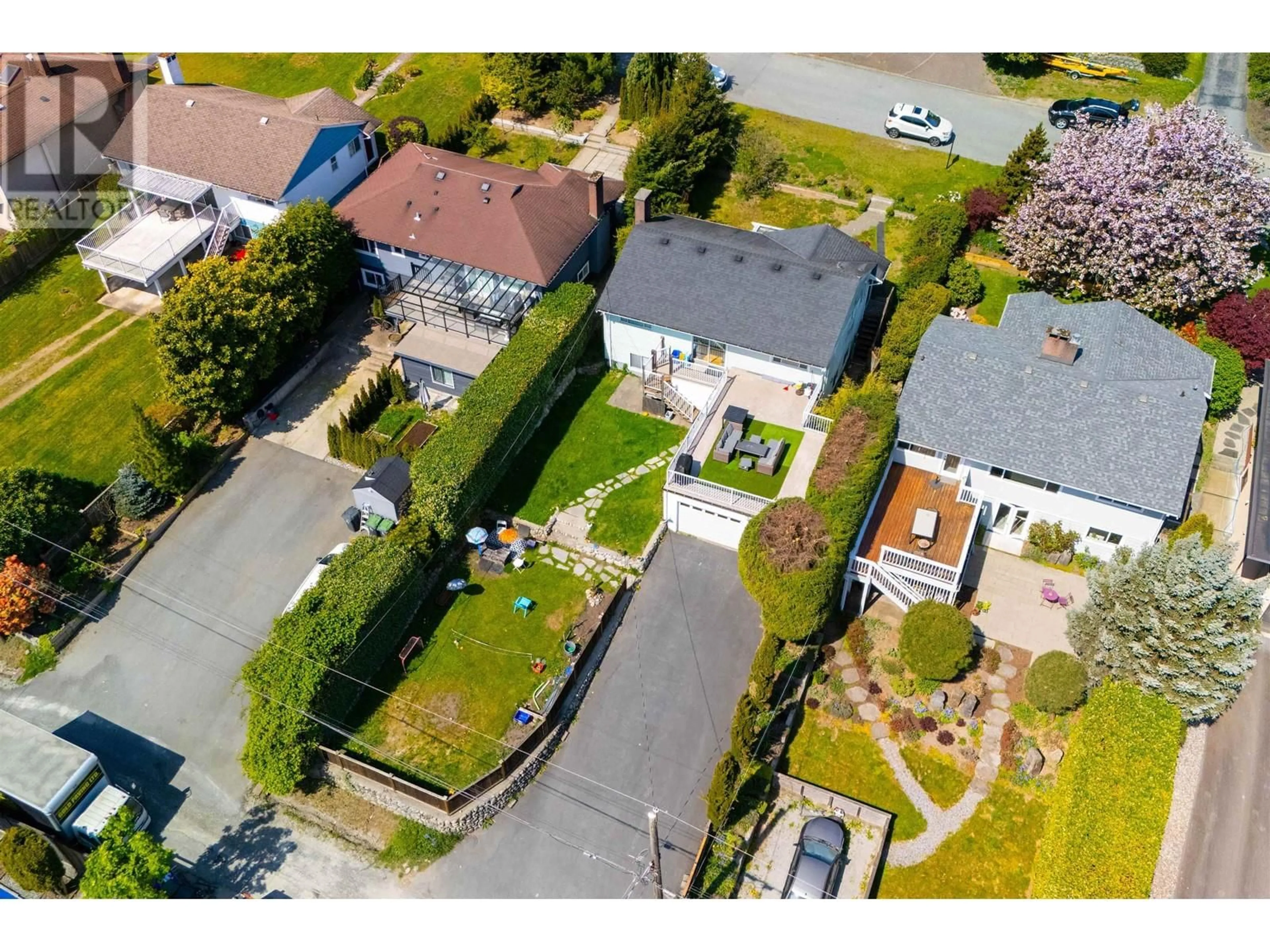 A pic from outside/outdoor area/front of a property/back of a property/a pic from drone, street for 1059 CALVERHALL STREET, North Vancouver British Columbia V7L1Y4