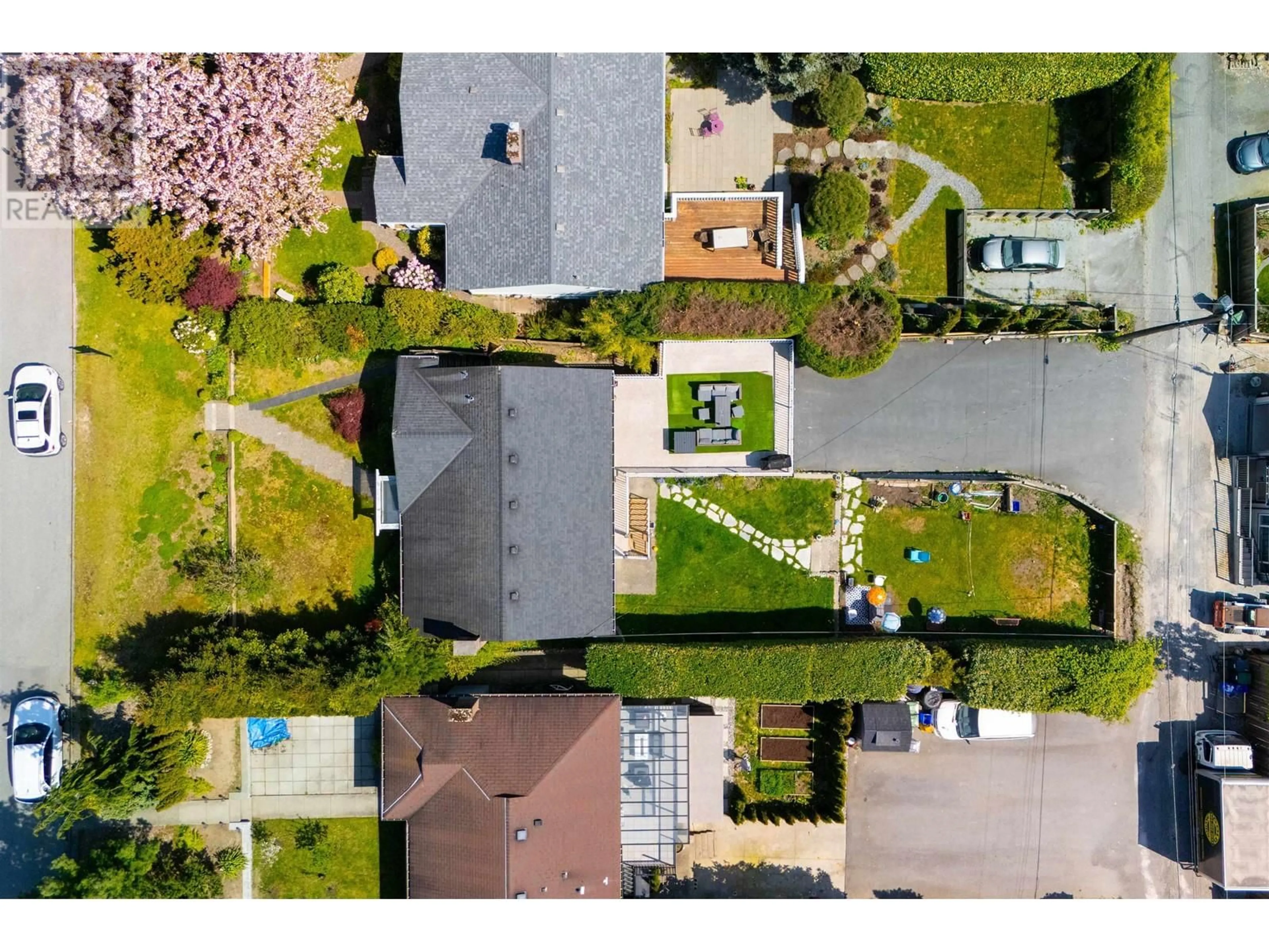 A pic from outside/outdoor area/front of a property/back of a property/a pic from drone, street for 1059 CALVERHALL STREET, North Vancouver British Columbia V7L1Y4