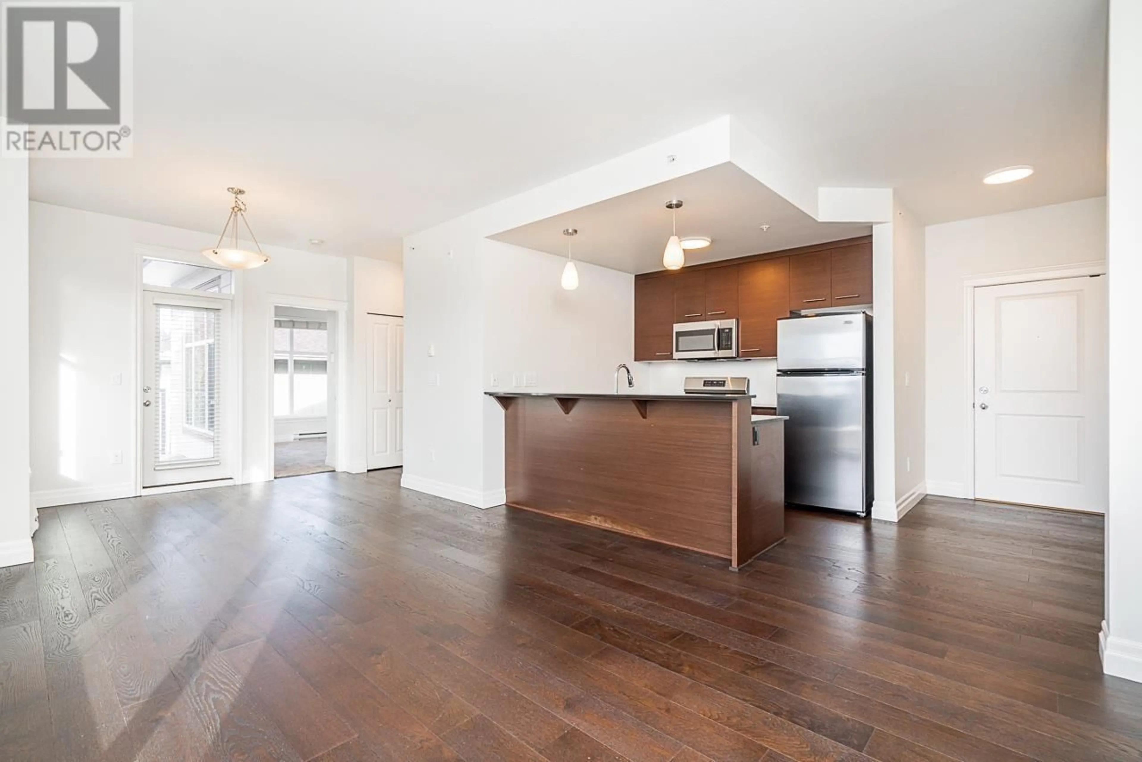 Open concept kitchen, wood/laminate floor for 413 - 2343 ATKINS AVENUE, Port Coquitlam British Columbia V3C1Y7