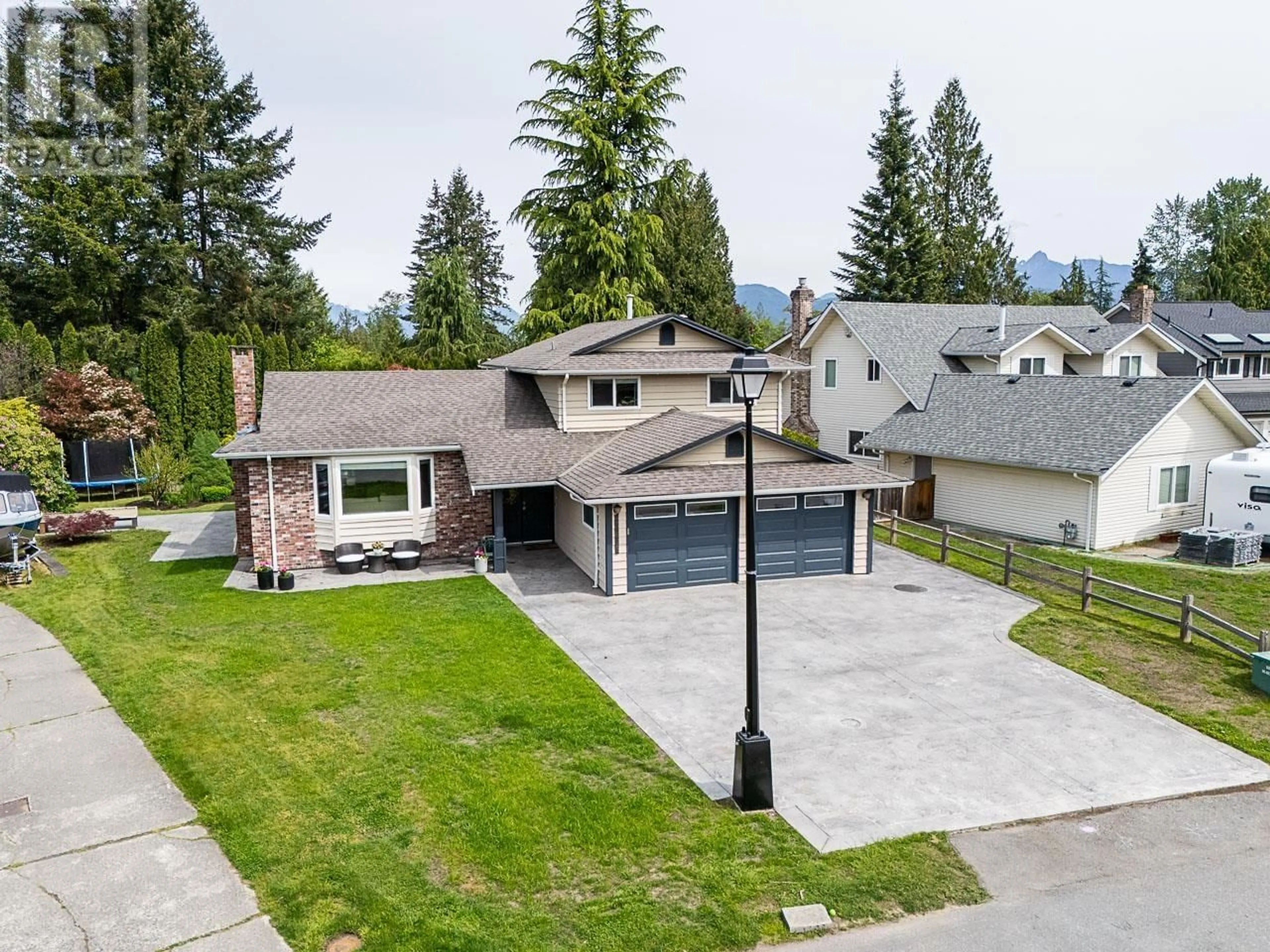 A pic from outside/outdoor area/front of a property/back of a property/a pic from drone, mountain view for 20685 125 AVENUE, Maple Ridge British Columbia V2X8N9