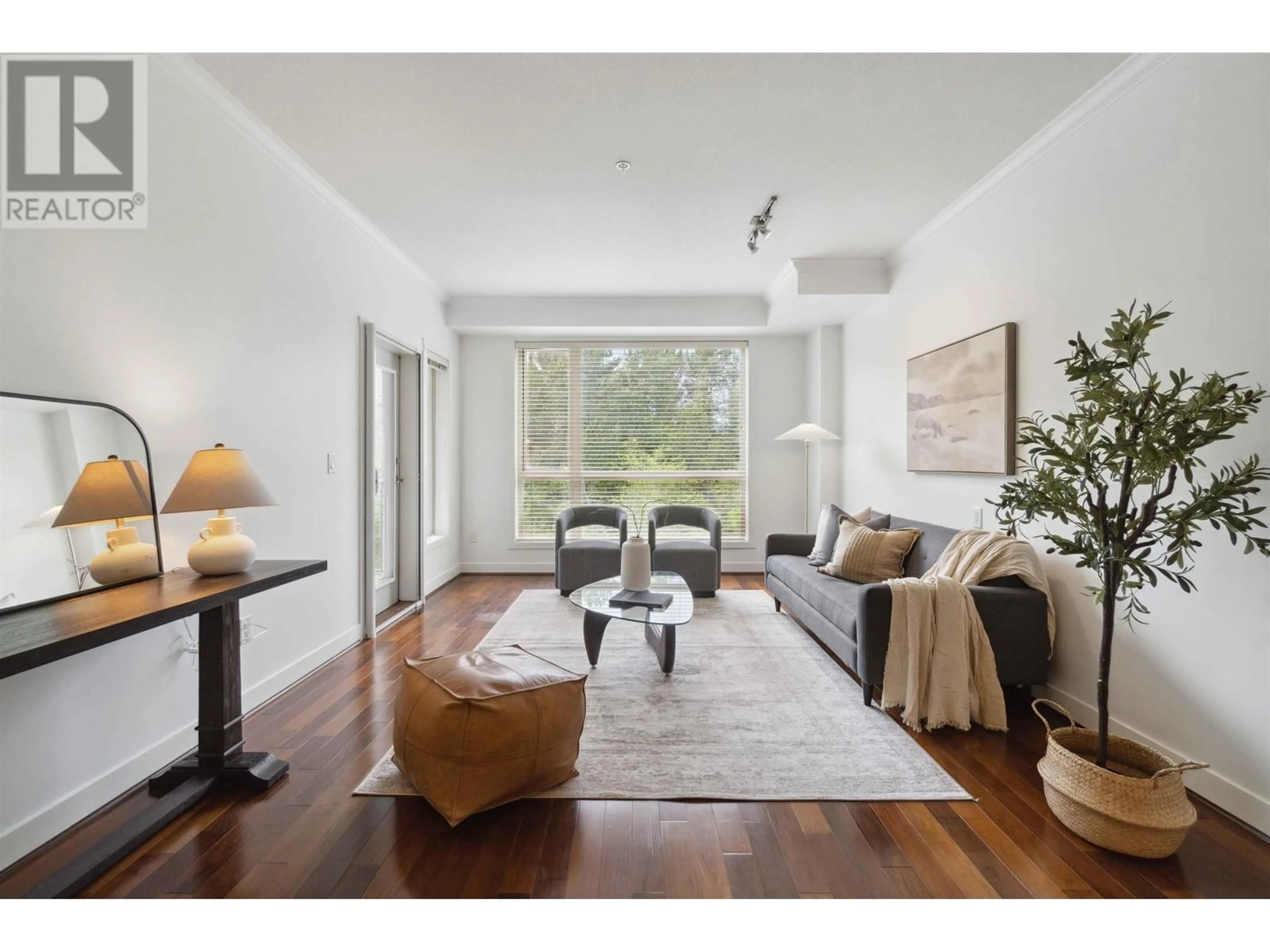 Living room with furniture, wood/laminate floor for 307 - 2628 MAPLE STREET, Port Coquitlam British Columbia V3C0E2