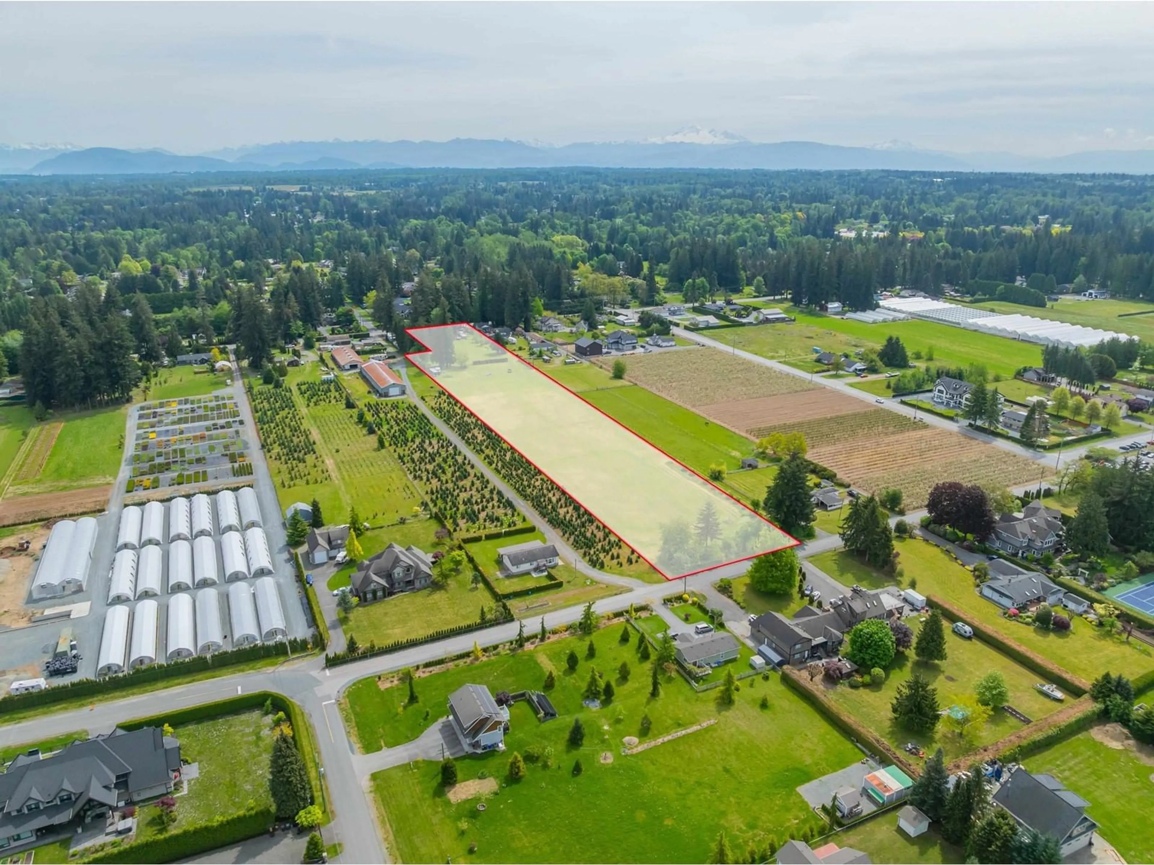 A pic from outside/outdoor area/front of a property/back of a property/a pic from drone, mountain view for 5281 240, Langley British Columbia V2Z2N3